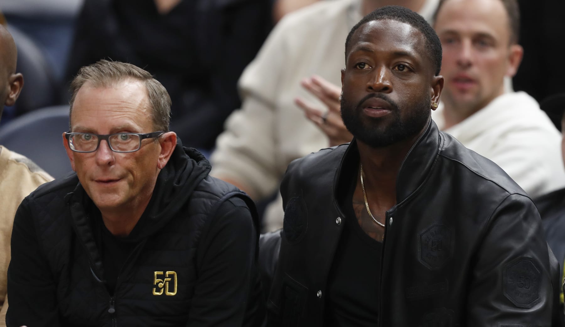 SALT LAKE CITY, UT - OCTOBER 27:  Justin Zanik general manager of the Utah Jazz sits with minority owner Dwayne Wade during the second half of their game against the Los Angeles Clippers at the Delta Center on October 26 2023 in Sandy, Utah. NOTE TO USER: User expressly acknowledges and agrees that, by downloading and or using this photograph, User is consenting to the terms and conditions of the Getty Images License Agreement. (Photo by Chris Gardner/Getty Images)