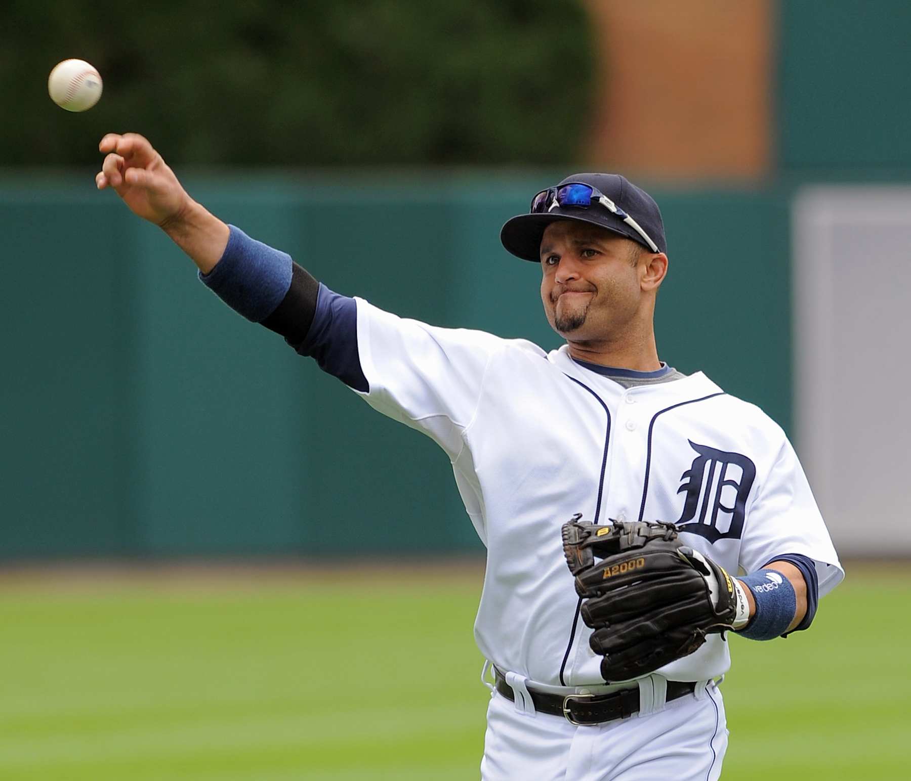 DETROIT - AUGUST 30:  Placido Polanco #14 of the Detroit Tigers throws to first base against the Tampa Bay Rays during the game at Comerica Park on August 30, 2009 in Detroit, Michigan. The Tigers defeated the Rays 4-3.  (Photo by Mark Cunningham/MLB Photos via Getty Images)