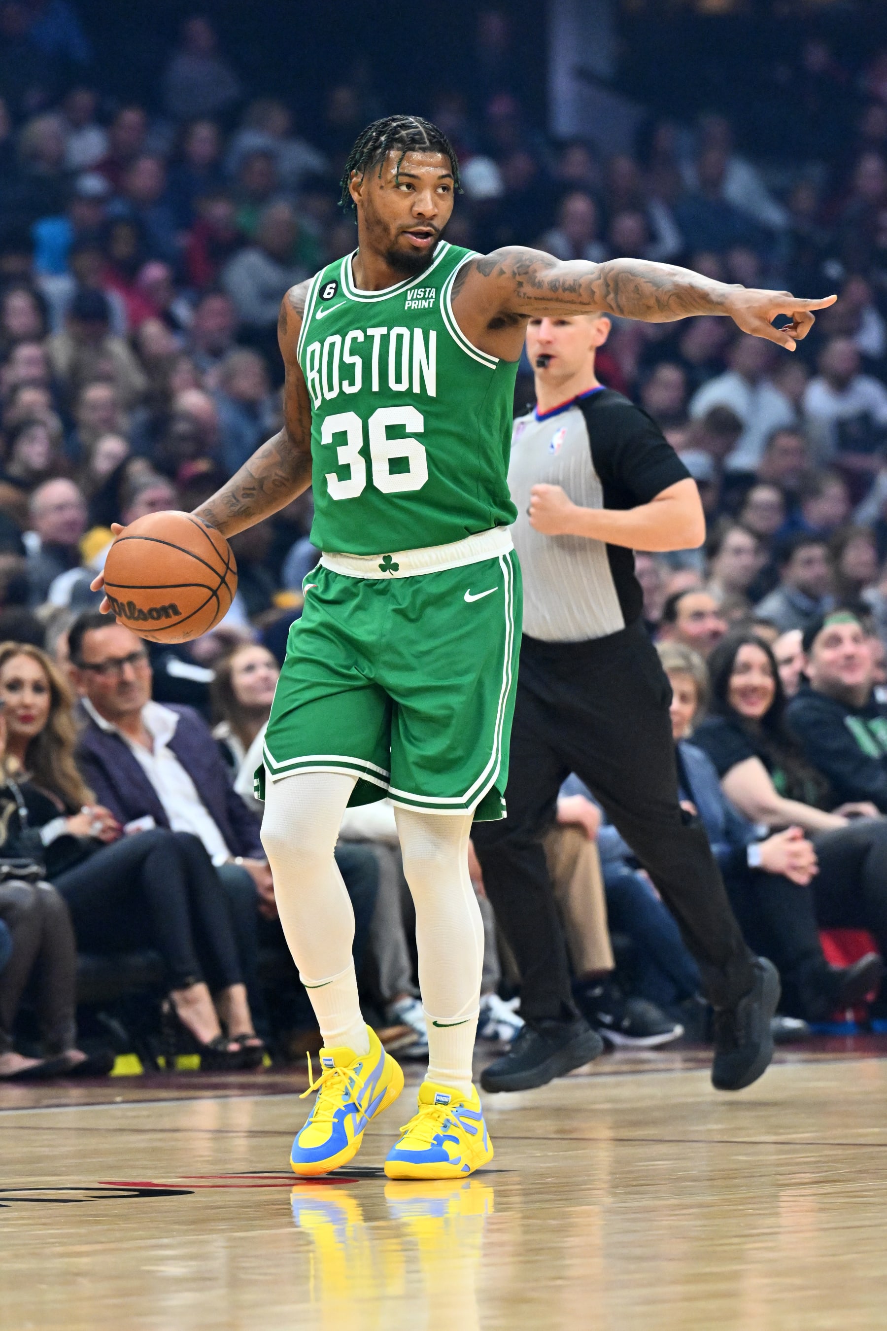 CLEVELAND, OHIO - MARCH 06: Marcus Smart #36 of the Boston Celtics brings the ball up court during the first quarter against the Cleveland Cavaliers at Rocket Mortgage Fieldhouse on March 06, 2023 in Cleveland, Ohio. NOTE TO USER: User expressly acknowledges and agrees that, by downloading and or using this photograph, User is consenting to the terms and conditions of the Getty Images License Agreement. (Photo by Jason Miller/Getty Images)