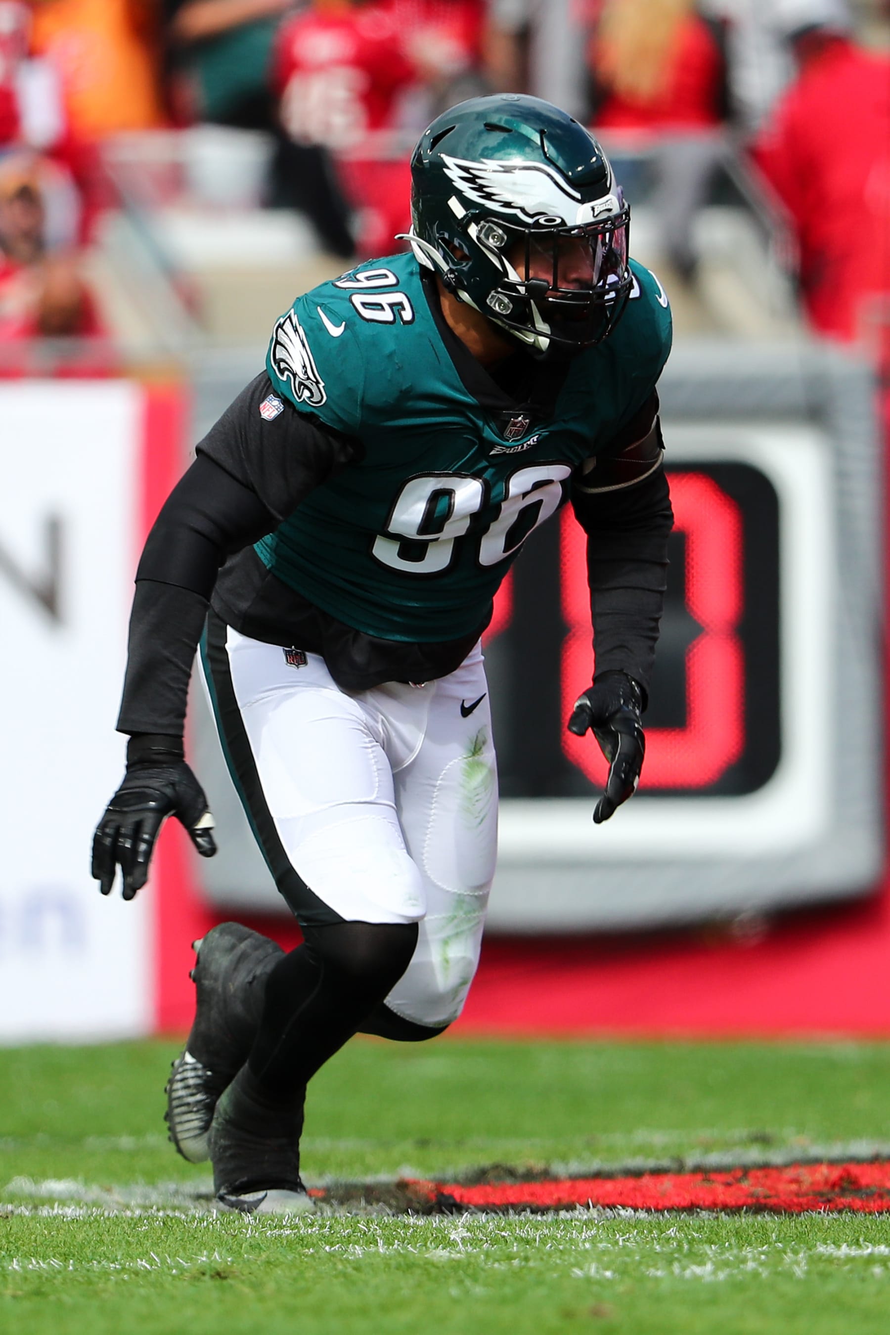 TAMPA, FL - JANUARY 16: Derek Barnett #96 of the Philadelphia Eagles rushes the passer during the NFC Wild Card Playoff game against the Tampa Bay Buccaneers at Raymond James Stadium on January 16, 2022 in Tampa, Florida. (Photo by Kevin Sabitus/Getty Images)