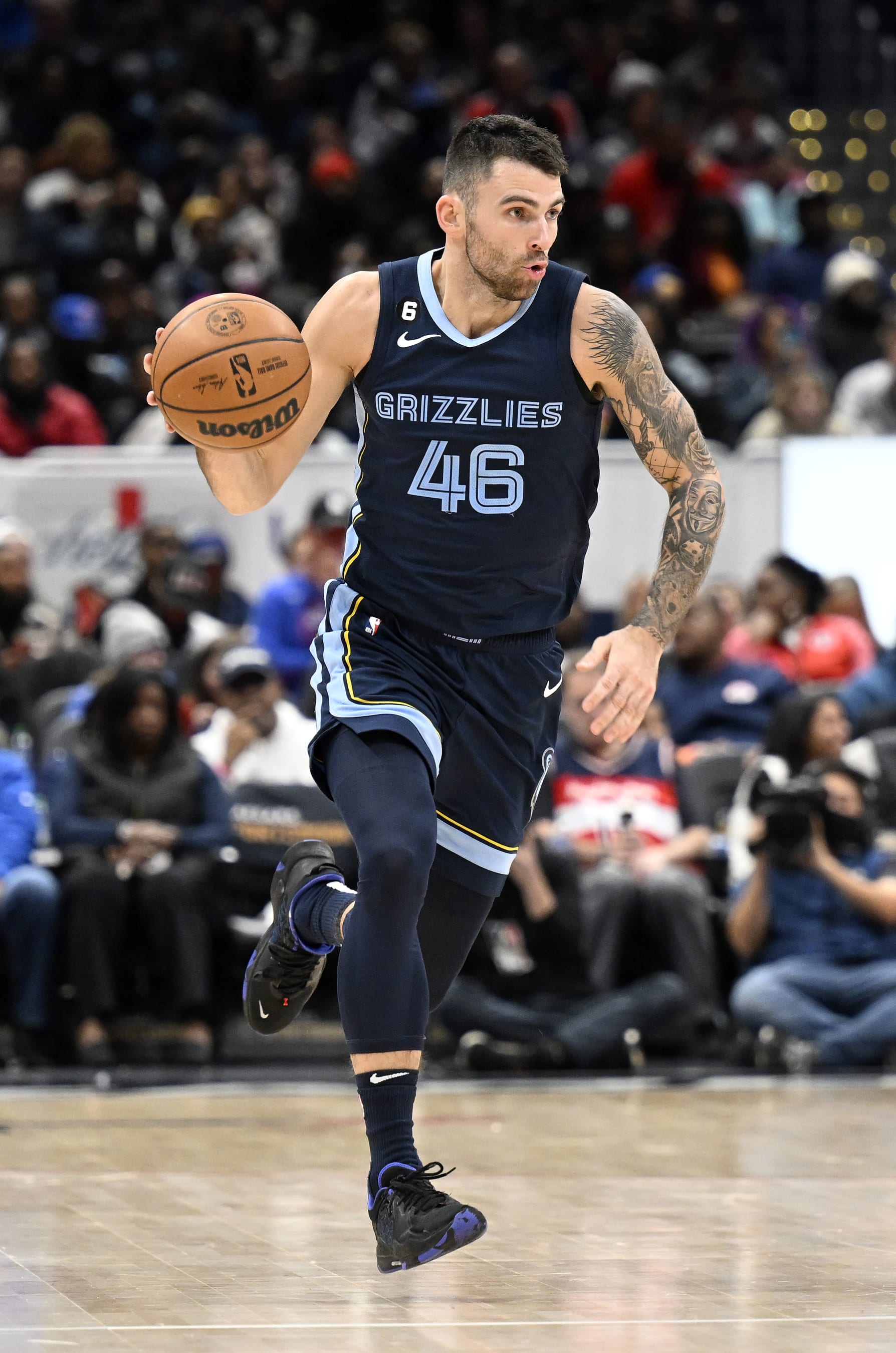 WASHINGTON, DC - NOVEMBER 13: John Konchar #46 of the Memphis Grizzlies handles the ball against the Washington Wizards at Capital One Arena on November 13, 2022 in Washington, DC. NOTE TO USER: User expressly acknowledges and agrees that, by downloading and or using this photograph, User is consenting to the terms and conditions of the Getty Images License Agreement. (Photo by G Fiume/Getty Images)