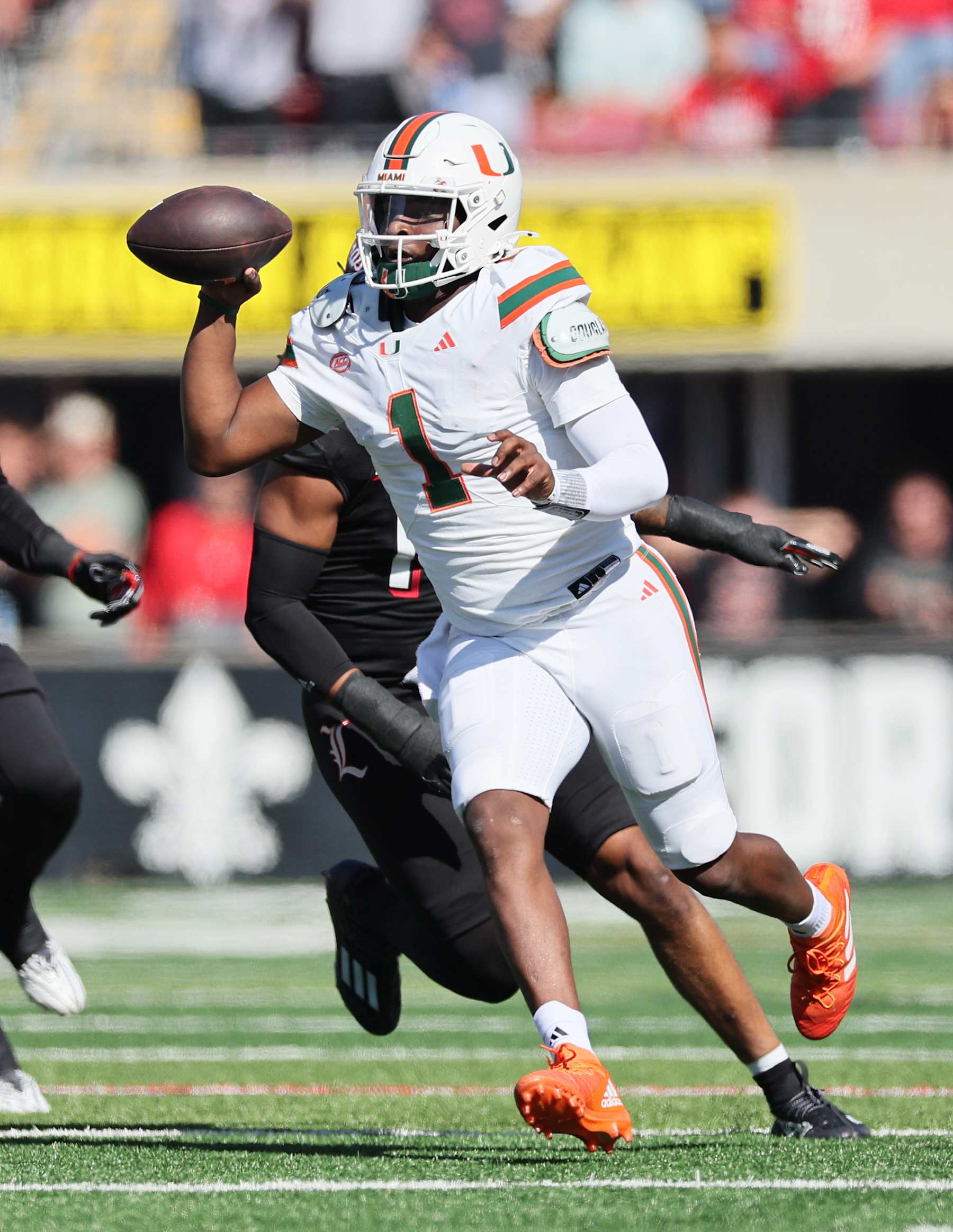 LOUISVILLE, KENTUCKY - OCTOBER 19: Cam Ward #1 of the Miami Hurricanes runs with the ball against the Louisville Cardinals at Cardinal Stadium on October 19, 2024 in Louisville, Kentucky. (Photo by Andy Lyons/Getty Images)