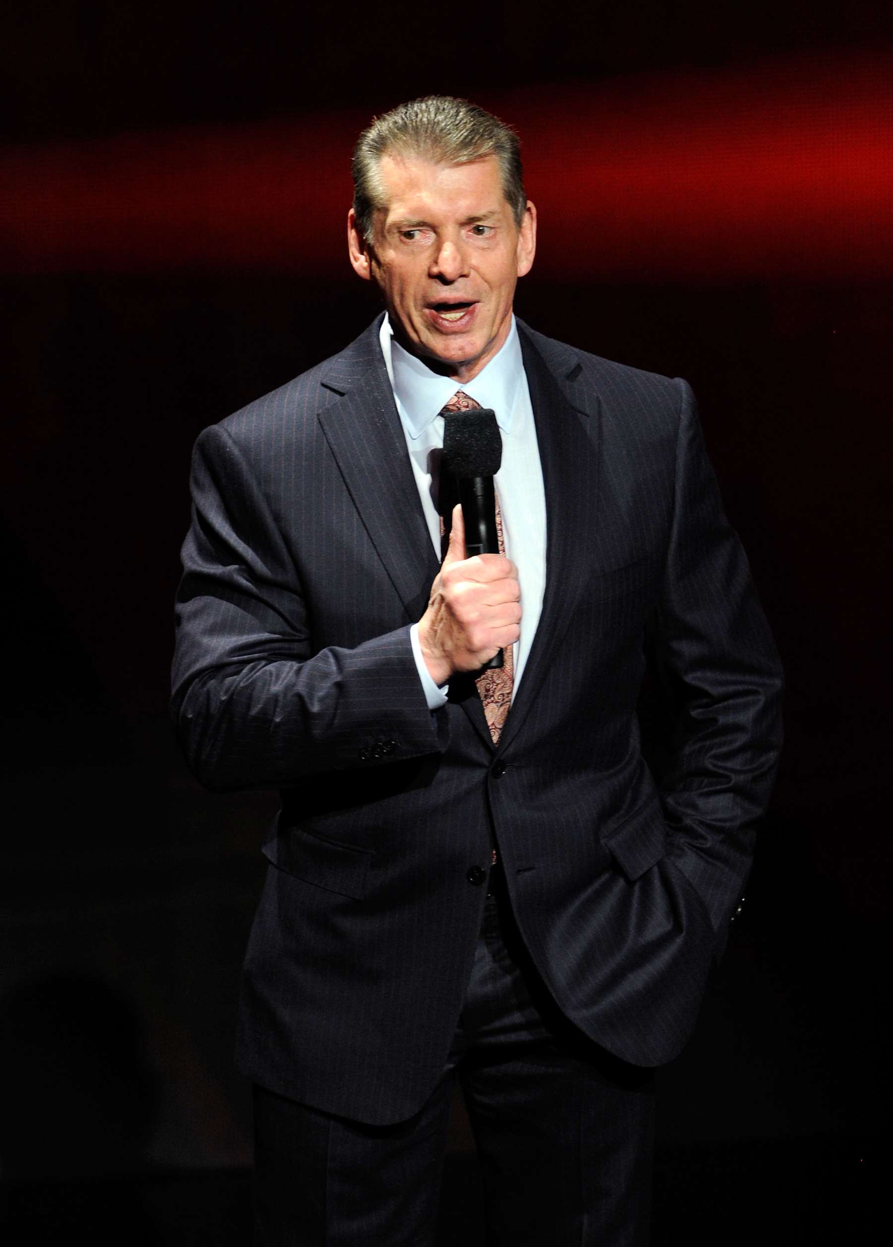 LAS VEGAS, NV - JANUARY 08:  WWE Chairman and CEO Vince McMahon speaks at a news conference announcing the WWE Network at the 2014 International CES at the Encore Theater at Wynn Las Vegas on January 8, 2014 in Las Vegas, Nevada. The network will launch on February 24, 2014 as the first-ever 24/7 streaming network, offering both scheduled programs and video on demand. The USD 9.99 per month subscription will include access to all 12 live WWE pay-per-view events each year. CES, the world's largest annual consumer technology trade show, runs through January 10 and is expected to feature 3,200 exhibitors showing off their latest products and services to about 150,000 attendees.  (Photo by Ethan Miller/Getty Images)