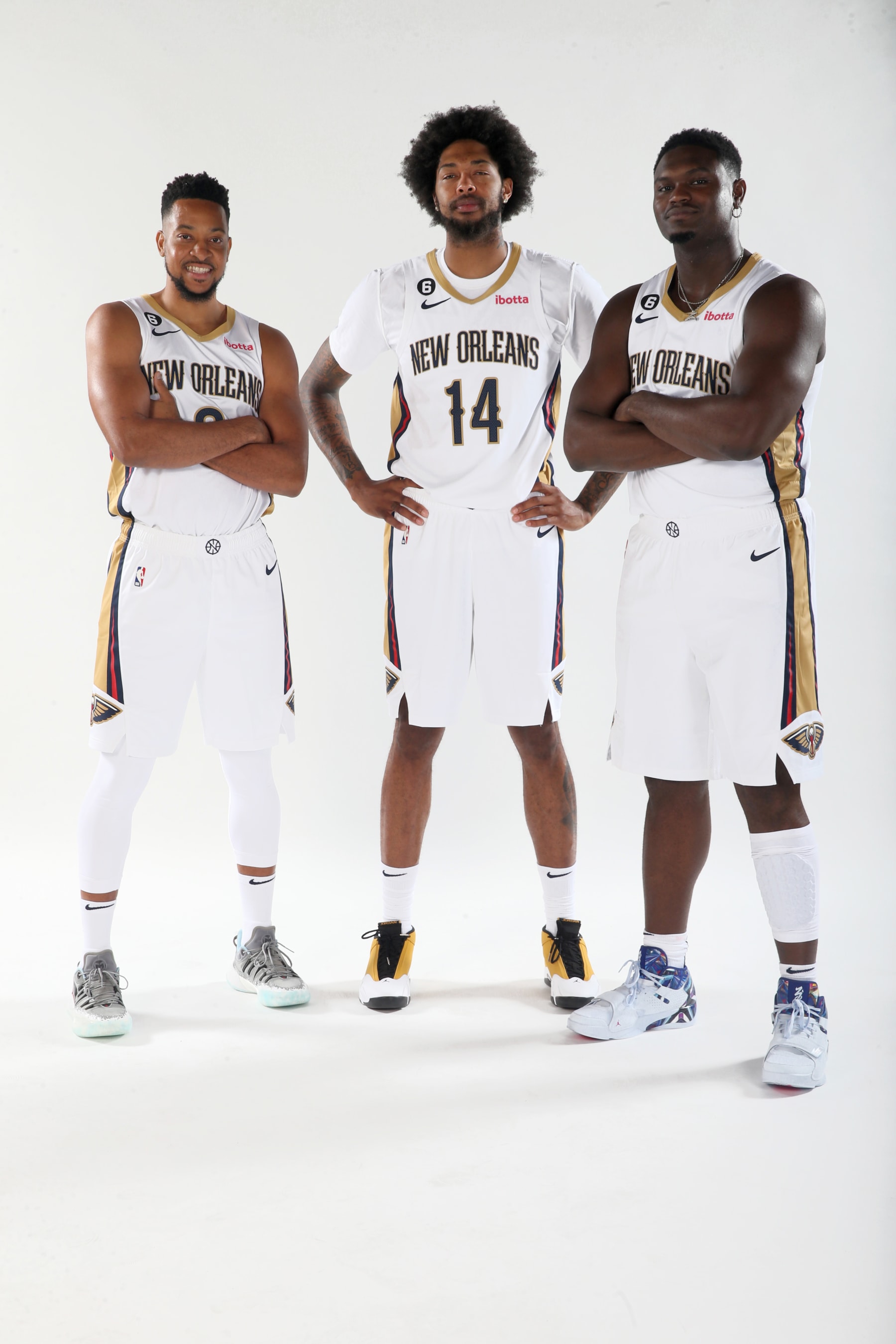 NEW ORLEANS, LA - SEPTEMBER 26: CJ McCollum #3,  Brandon Ingram #14, and Zion Williamson #1 of the New Orleans Pelicans poses for a photograph in New Orleans, Louisiana. NOTE TO USER: User expressly acknowledges and agrees that, by downloading and or using this Photograph, user is consenting to the terms and conditions of the Getty Images License Agreement. Mandatory Copyright Notice: Copyright 2022 NBAE (Photo by Layne Murdoch Jr./NBAE via Getty Images)