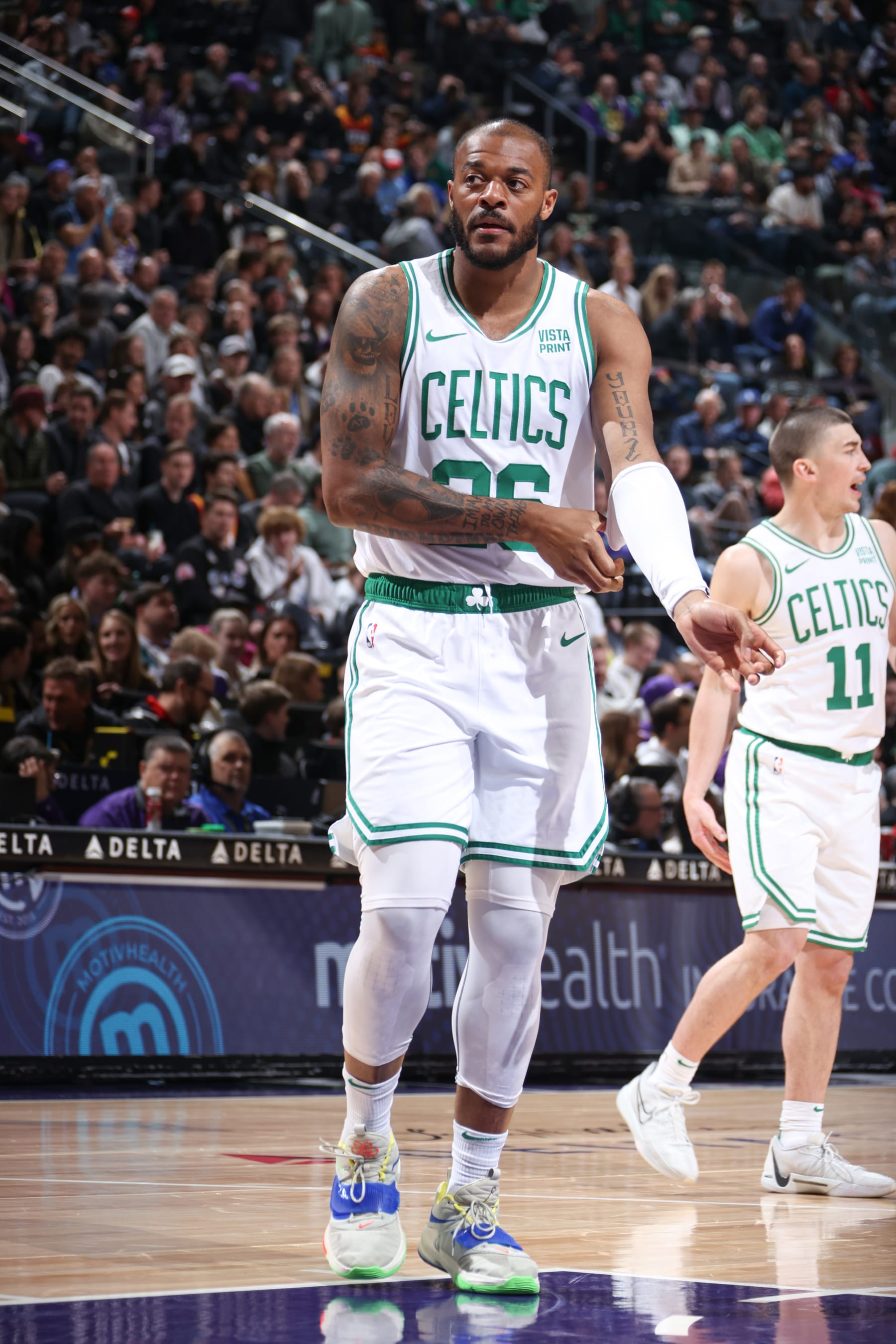 SALT LAKE CITY, UT - MARCH 12:  Xavier Tillman #26 of the Boston Celtics looks on during the game on March 12, 2024 at Delta Center in Salt Lake City, Utah. NOTE TO USER: User expressly acknowledges and agrees that, by downloading and or using this Photograph, User is consenting to the terms and conditions of the Getty Images License Agreement. Mandatory Copyright Notice: Copyright 2024 NBAE (Photo by Melissa Majchrzak/NBAE via Getty Images)