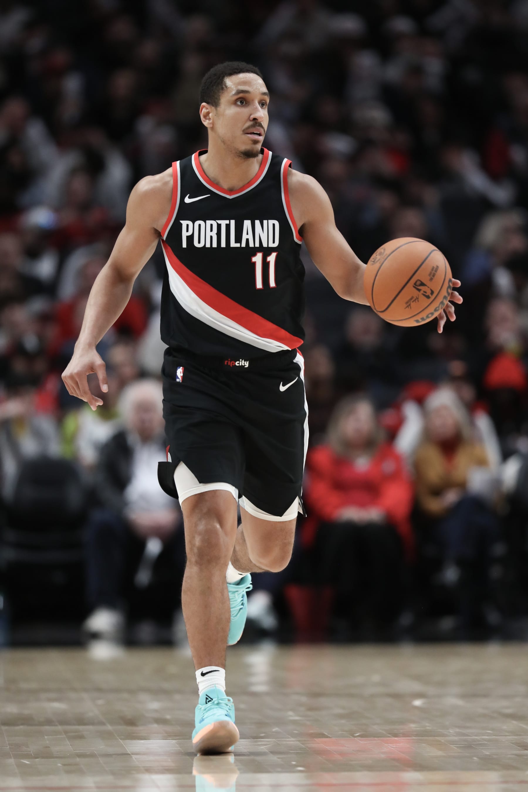 PORTLAND, OREGON - JANUARY 28: Malcolm Brogdon #11 of the Portland Trail Blazers plays against the Chicago Bulls during the third quarter at Moda Center on January 28, 2024 in Portland, Oregon. NOTE TO USER: User expressly acknowledges and agrees that, by downloading and or using this photograph, User is consenting to the terms and conditions of the Getty Images License Agreement.  (Photo by Amanda Loman/Getty Images)
