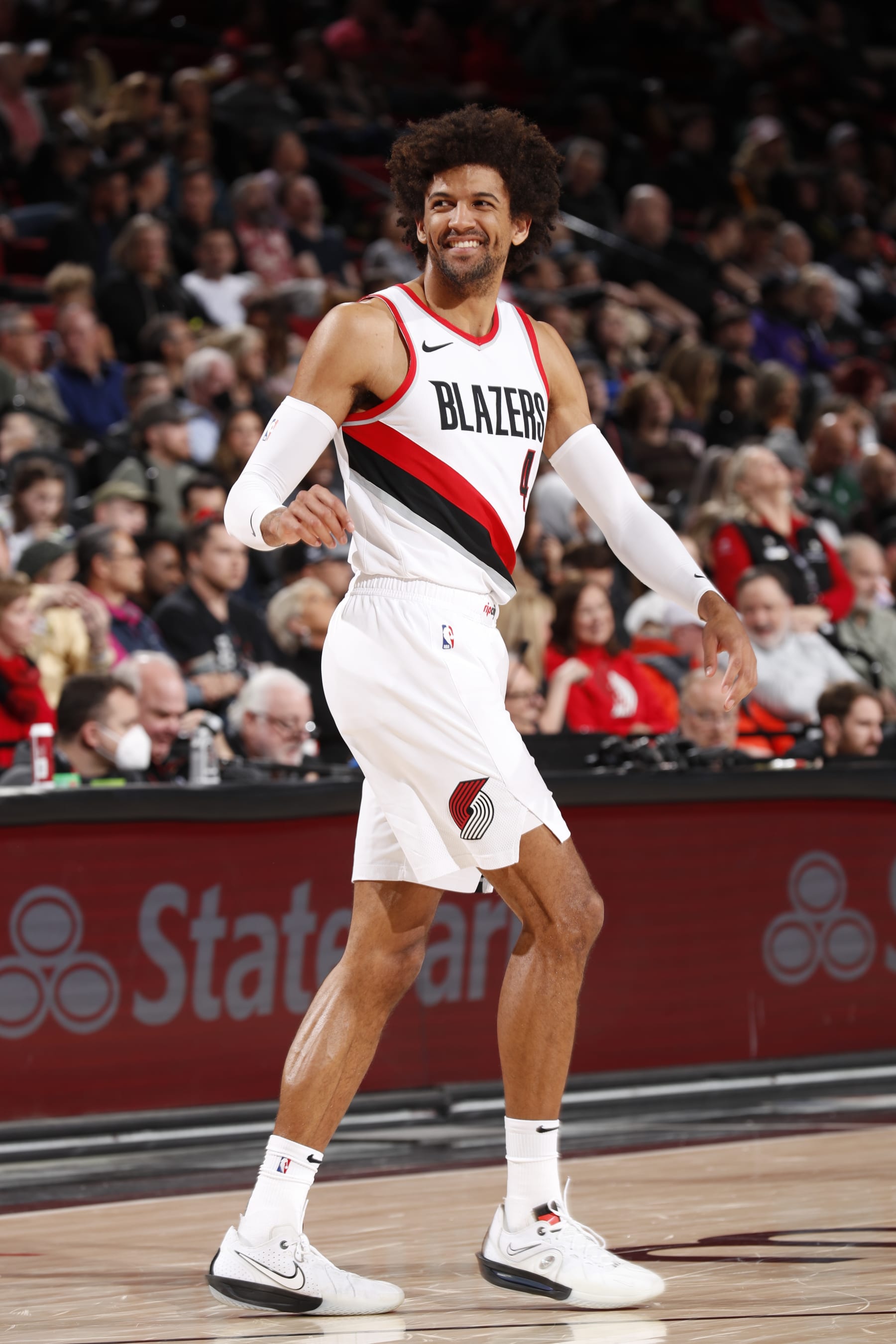 PORTLAND, OR - MARCH 13:  Matisse Thybulle #4 of the Portland Trail Blazers looks on during the game on March 13, 2024 at the Moda Center Arena in Portland, Oregon. NOTE TO USER: User expressly acknowledges and agrees that, by downloading and or using this photograph, user is consenting to the terms and conditions of the Getty Images License Agreement. Mandatory Copyright Notice: Copyright 2024 NBAE (Photo by Cameron Browne/NBAE via Getty Images)