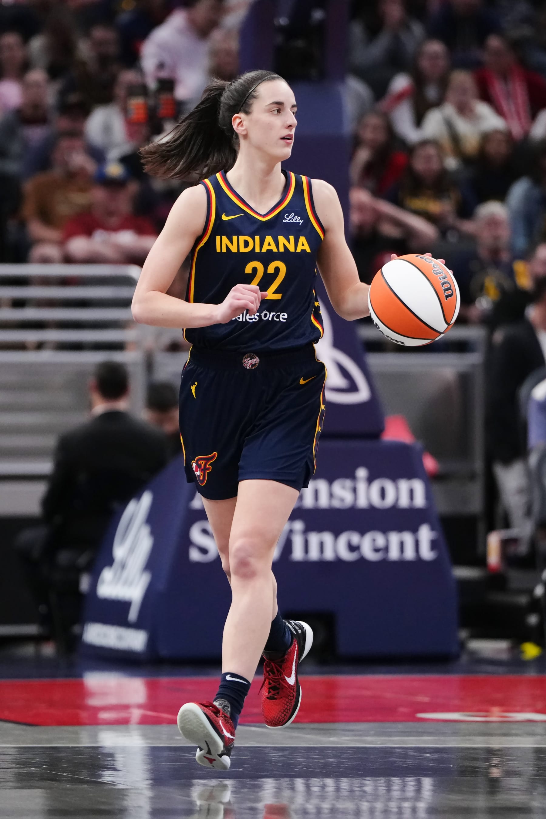 INDIANAPOLIS, INDIANA - MAY 16: Caitlin Clark #22 of the Indiana Fever dribbles the ball in the third quarter against the New York Liberty at Gainbridge Fieldhouse on May 16, 2024 in Indianapolis, Indiana. NOTE TO USER: User expressly acknowledges and agrees that, by downloading and or using this photograph, User is consenting to the terms and conditions of the Getty Images License Agreement (Photo by Dylan Buell/Getty Images)
