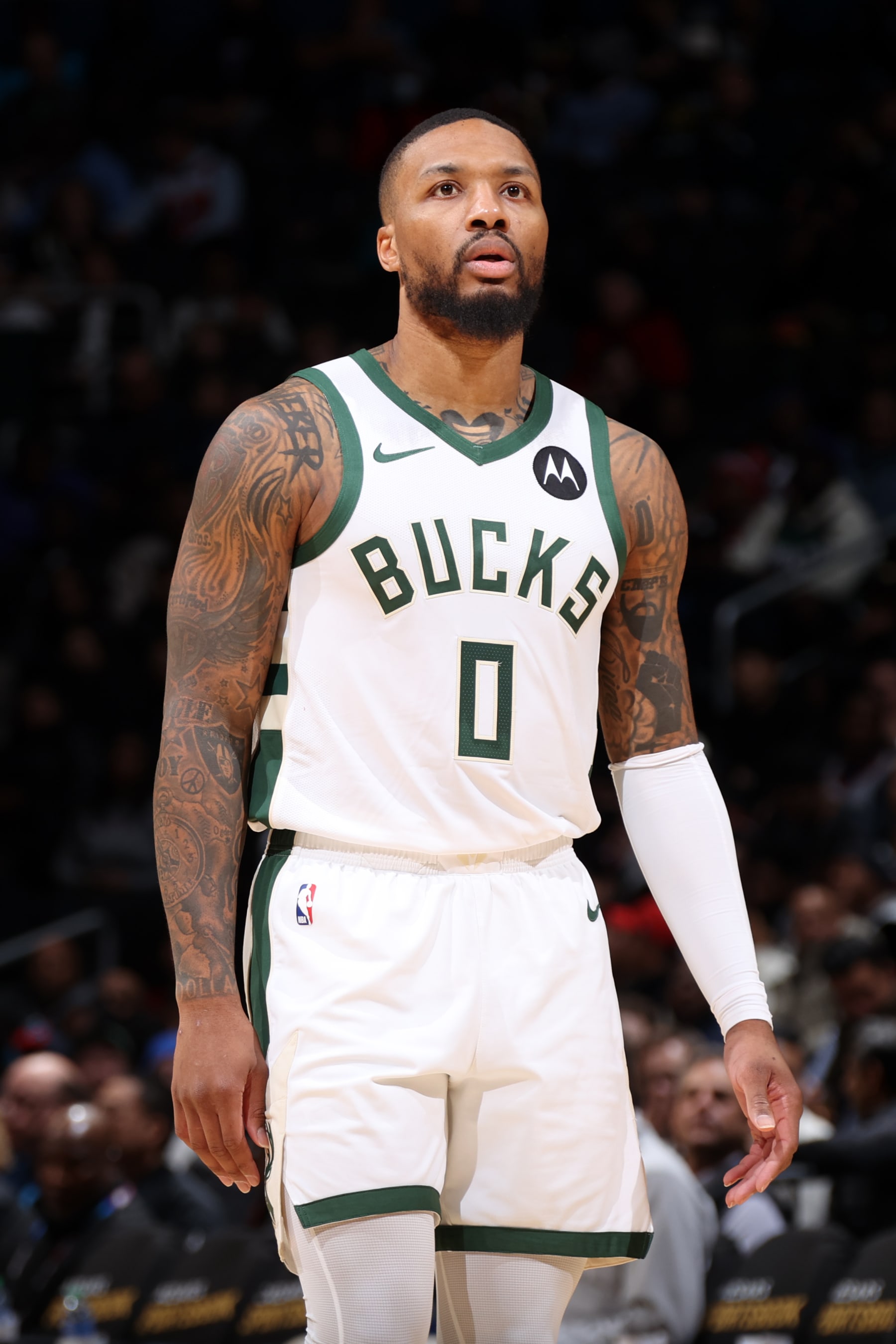 WASHINGTON, DC -  NOVEMBER 20:  Damian Lillard #0 of the Milwaukee Bucks looks on during the game against the Washington Wizards on November 20, 2023 at Capital One Arena in Washington, DC. NOTE TO USER: User expressly acknowledges and agrees that, by downloading and or using this Photograph, user is consenting to the terms and conditions of the Getty Images License Agreement. Mandatory Copyright Notice: Copyright 2023 NBAE (Photo by KeShawn Ennis/NBAE via Getty Images)