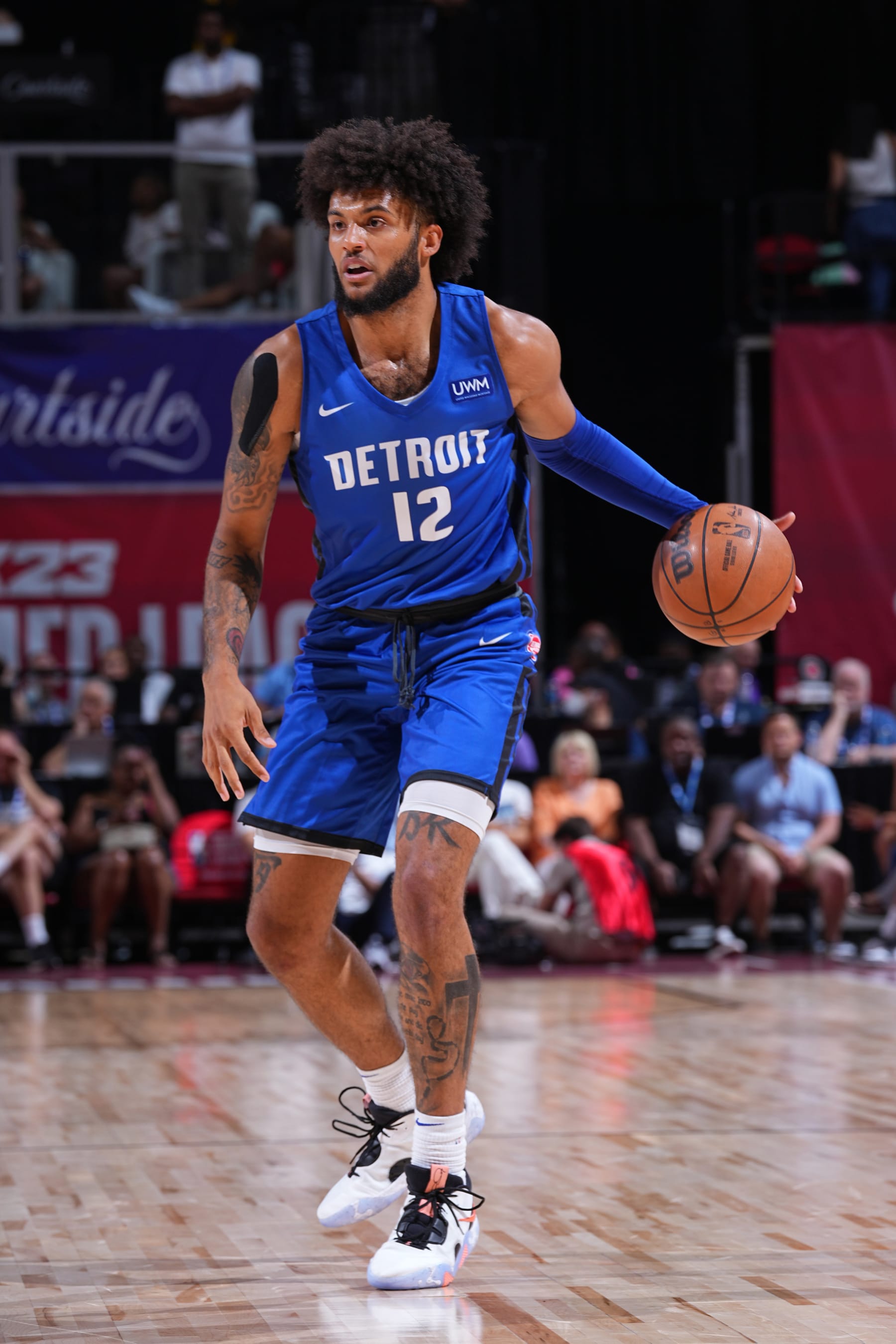 Las Vegas, NV - JULY 9: Isaiah Livers #12 of the Detroit Pistons dribbles the ball against the Washington Wizards during the 2022 Las Vegas Summer League on July 9, 2022 at the Thomas & Mack Center in Las Vegas, Nevada. NOTE TO USER: User expressly acknowledges and agrees that, by downloading and/or using this Photograph, user is consenting to the terms and conditions of the Getty Images License Agreement. Mandatory Copyright Notice: Copyright 2022 NBAE (Photo by Bart Young/NBAE via Getty Images)