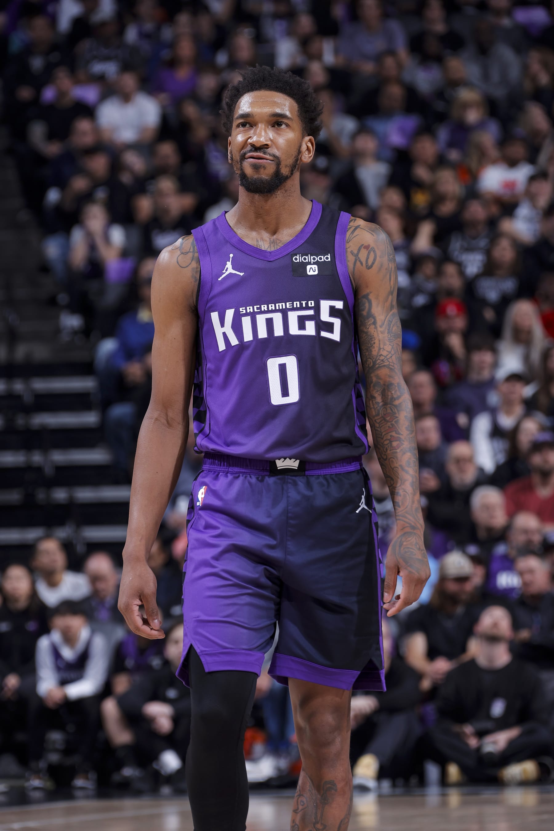 SACRAMENTO, CA - MARCH 26: Malik Monk #0 of the Sacramento Kings looks on during the game against the Dallas Mavericks on March 26, 2024 at Golden 1 Center in Sacramento, California. NOTE TO USER: User expressly acknowledges and agrees that, by downloading and or using this Photograph, user is consenting to the terms and conditions of the Getty Images License Agreement. Mandatory Copyright Notice: Copyright 2024 NBAE (Photo by Rocky Widner/NBAE via Getty Images)