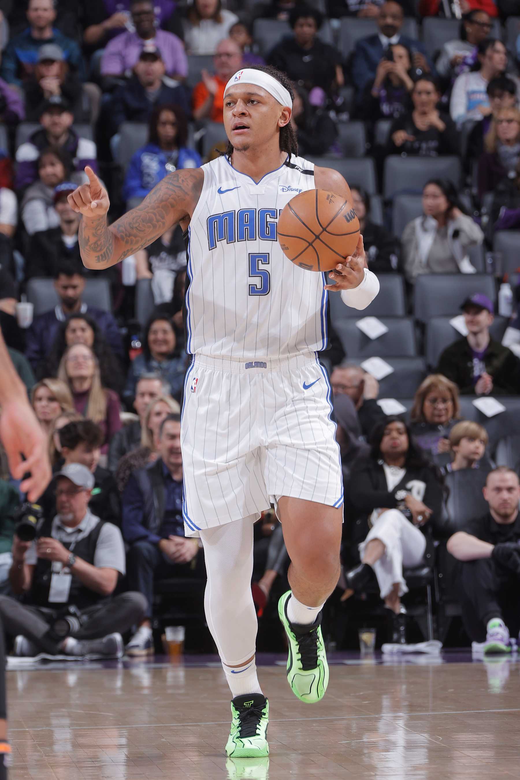 SACRAMENTO, CA - FEBRUARY 5:  Paolo Banchero #5 of the Orlando Magic handles the ball during the game against the Sacramento Kings on February 5, 2025 at Golden 1 Center in Sacramento, California. NOTE TO USER: User expressly acknowledges and agrees that, by downloading and or using this Photograph, user is consenting to the terms and conditions of the Getty Images License Agreement. Mandatory Copyright Notice: Copyright 2025 NBAE (Photo by Rocky Widner/NBAE via Getty Images)