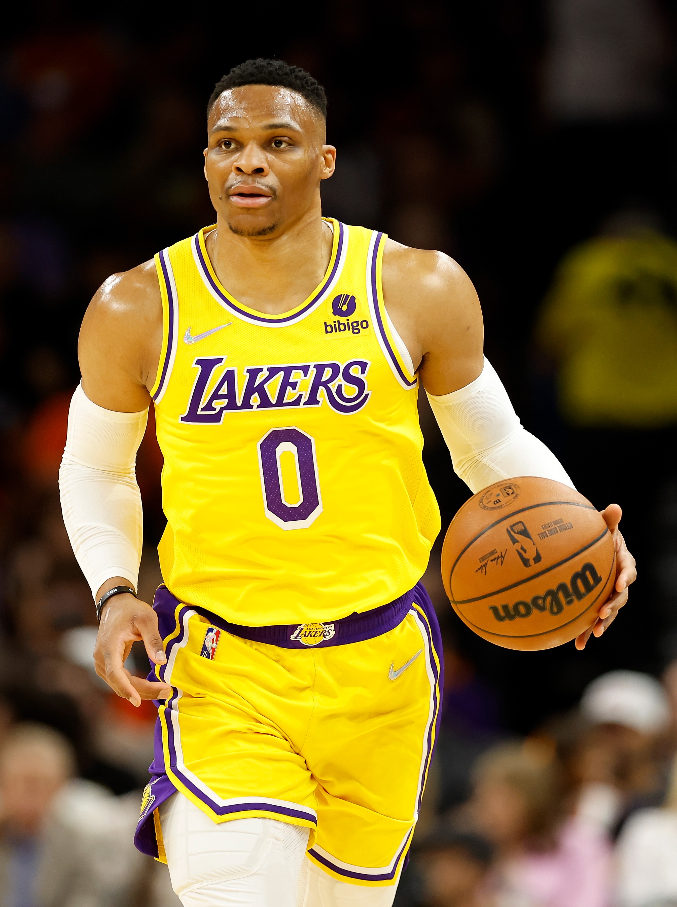 PHOENIX, ARIZONA - APRIL 05: Russell Westbrook #0 of the Los Angeles Lakers handles the ball during the first half of the NBA game at Footprint Center on April 05, 2022 in Phoenix, Arizona.  NOTE TO USER: User expressly acknowledges and agrees that, 
by downloading and or using this photograph, User is consenting to the terms and conditions of the Getty Images License Agreement. (Photo by Christian Petersen/Getty Images)