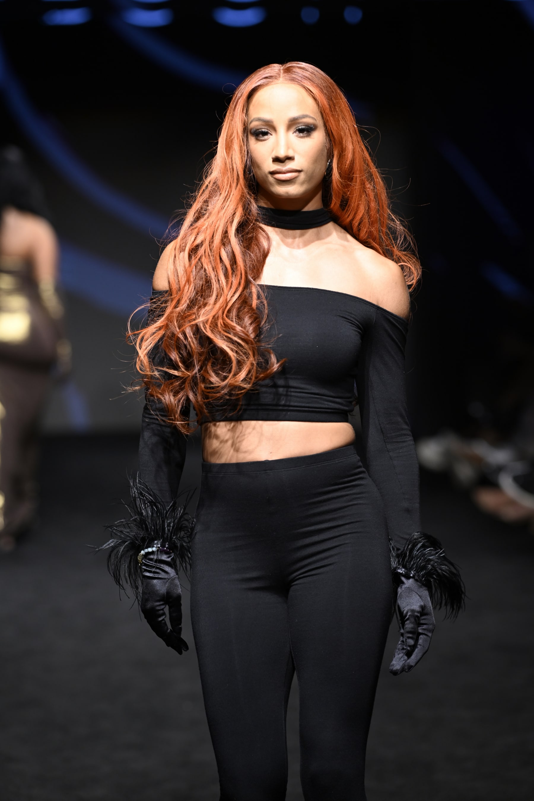 LOS ANGELES, CALIFORNIA - OCTOBER 14: Sasha Banks walks the runway wearing Diva Fashion Couture at The Majestic Downtown on October 14, 2022 in Los Angeles, California. (Photo by Arun Nevader/Getty Images for Art Hearts Fashion)