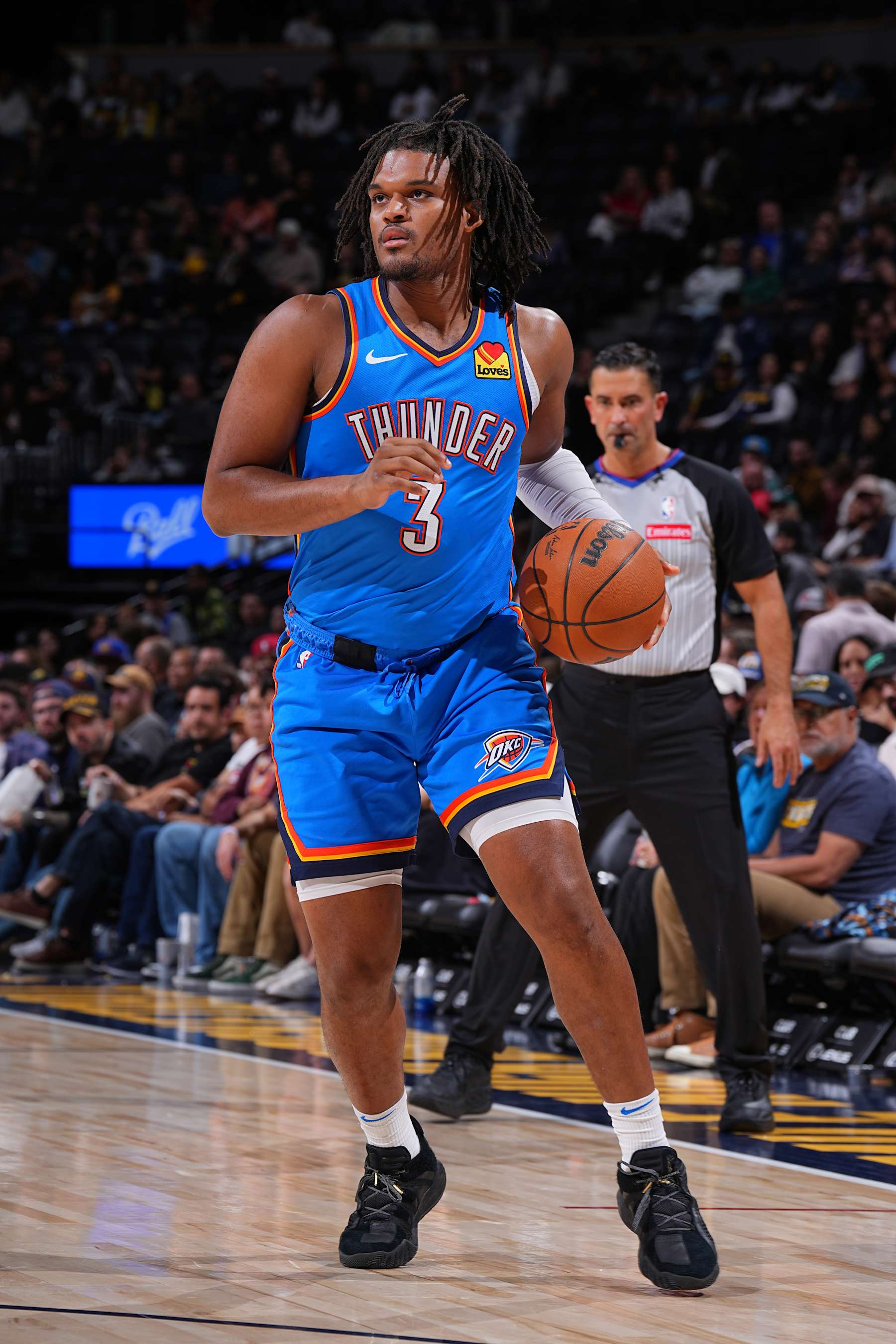 DENVER, CO - OCTOBER 15: Dillon Jones #3 of the Oklahoma City Thunder dribbles the ball during the game against the Denver Nuggets during a NBA preseason game on October 15, 2024 at Ball Arena in Denver, Colorado. NOTE TO USER: User expressly acknowledges and agrees that, by downloading and/or using this Photograph, user is consenting to the terms and conditions of the Getty Images License Agreement. Mandatory Copyright Notice: Copyright 2024 NBAE (Photo by Garrett Ellwood/NBAE via Getty Images)