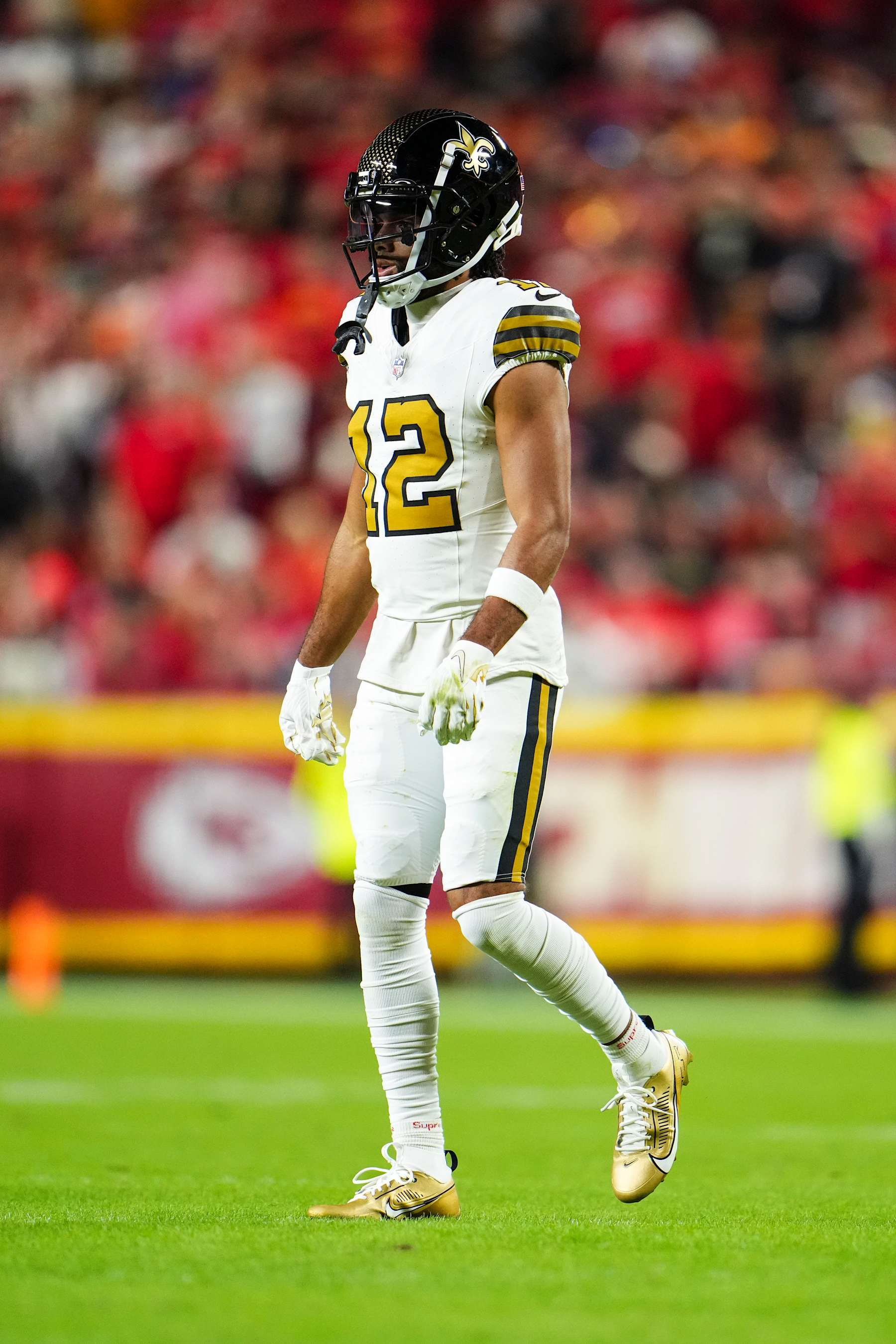 KANSAS CITY, MO - OCTOBER 07: Chris Olave #12 of the New Orleans Saints lines up before the snap during an NFL football game against the Kansas City Chiefs at GEHA Field at Arrowhead Stadium on October 7, 2024 in Kansas City, Missouri. (Photo by Cooper Neill/Getty Images)
