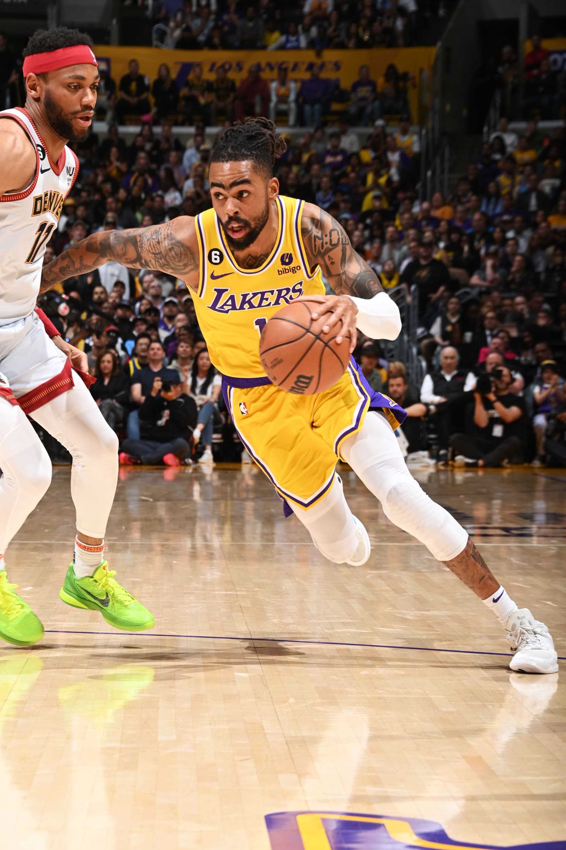 LOS ANGELES, CA - MAY 22: D'Angelo Russell #1 of the Los Angeles Lakers drives to the basket during Round 3 Game 4 of the Western Conference Finals 2023 NBA Playoffs against the Denver Nuggets on May 22, 2023 at Crypto.Com Arena in Los Angeles, California. NOTE TO USER: User expressly acknowledges and agrees that, by downloading and/or using this Photograph, user is consenting to the terms and conditions of the Getty Images License Agreement. Mandatory Copyright Notice: Copyright 2023 NBAE (Photo by Andrew D. Bernstein/NBAE via Getty Images)