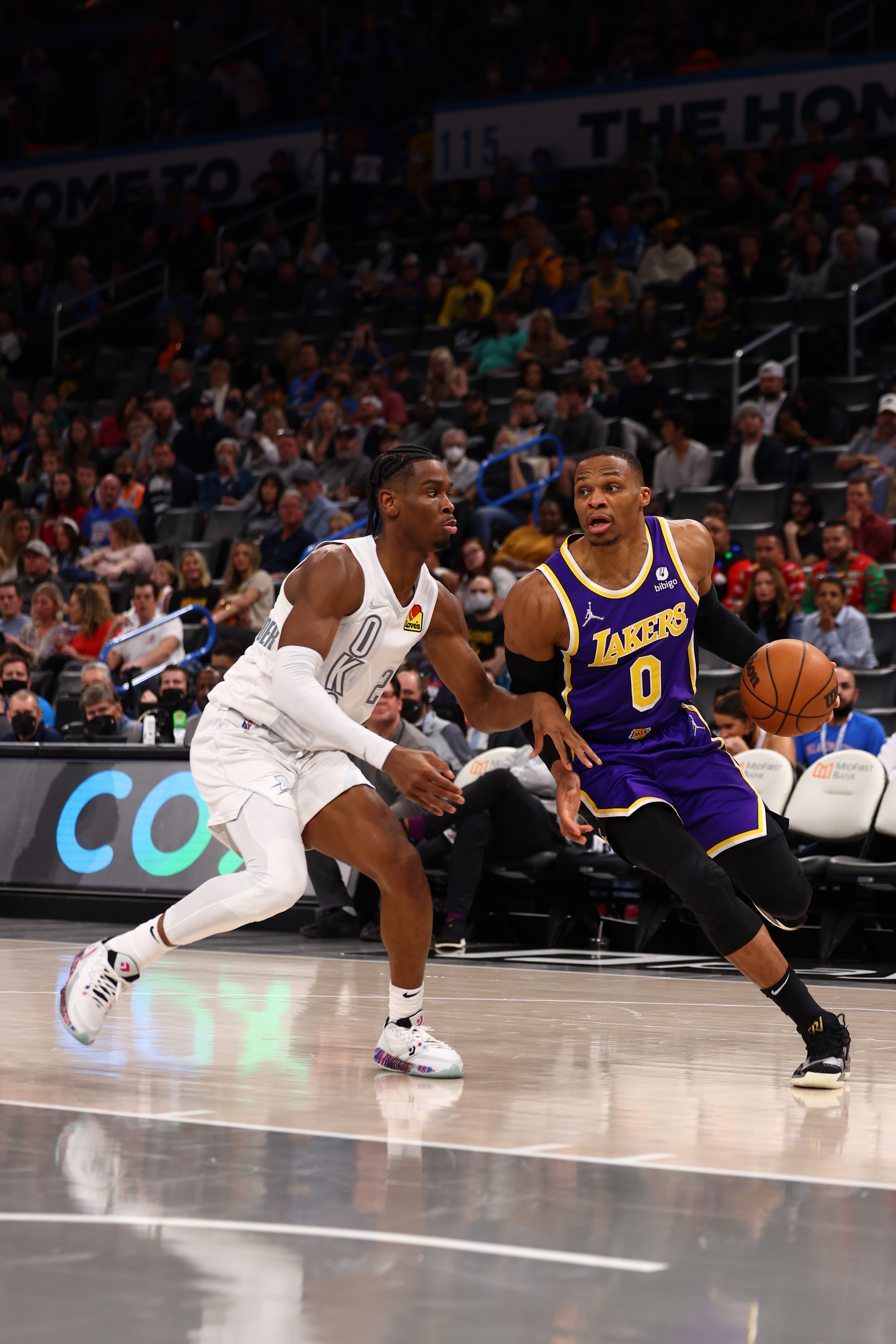 OKLAHOMA CITY, OK - DECEMBER 10: Russell Westbrook #0 of the Los Angeles Lakers dribbles the ball during the game against the Oklahoma City Thunder on December 10, 2021 at Paycom Arena in Oklahoma City, Oklahoma. NOTE TO USER: User expressly acknowledges and agrees that, by downloading and or using this photograph, User is consenting to the terms and conditions of the Getty Images License Agreement. Mandatory Copyright Notice: Copyright 2021 NBAE (Photo by Zach Beeker/NBAE via Getty Images)