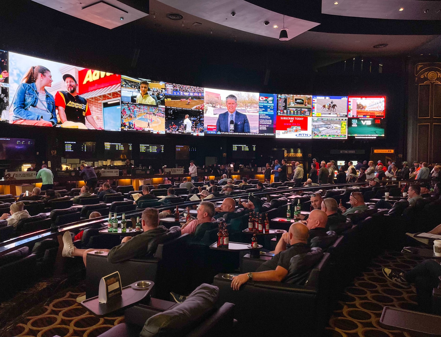LAS VEGAS, NV - FEBRUARY 12:  Gamblers jam into Caesars Sports Book at Caesars Palace Hotel & Casino to watch and bet on the Kansas City Chiefs vs Philadelphia Eagles in the National Football League's Super Bowl LVII (which is taking place in Glendale, Arizona) as viewed on February 12, 2023 in Las Vegas, Nevada. Las Vegas will play host to the NFL's Super Bowl LVIII, taking place next year at the recently constructed Allegiant Stadium, home of the Las Vegas Raiders. (Photo by George Rose/Getty Images)
