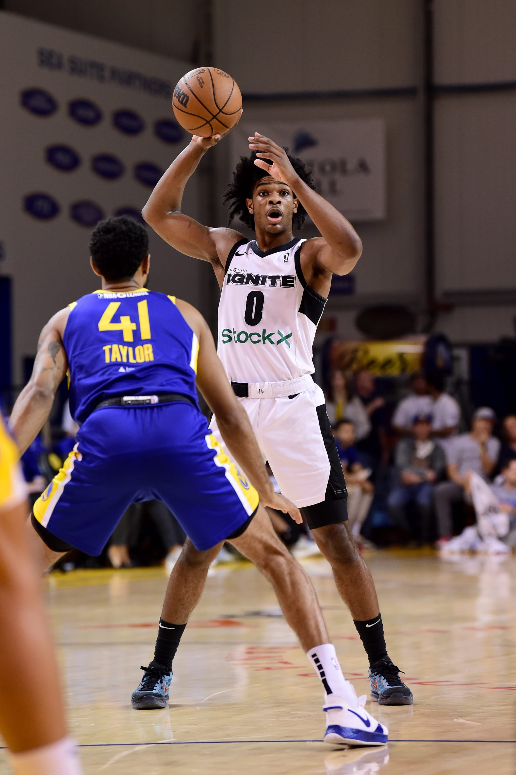 SANTA CRUZ, CA - FEBRUARY 28:  Scoot Henderson #0 of the Walnut Creak Ignite looks to pass against the Santa Cruz Warriors during the NBA G-League game on February 28, 2022 at the Kaiser Permanente Arena in Santa Cruz, California. NOTE TO USER: User expressly acknowledges and agrees that, by downloading and or using this photograph, user is consenting to the terms and conditions of Getty Images License Agreement. Mandatory Copyright Notice: Copyright 2021 NBAE (Photo by Noah Graham/NBAE via Getty Images)