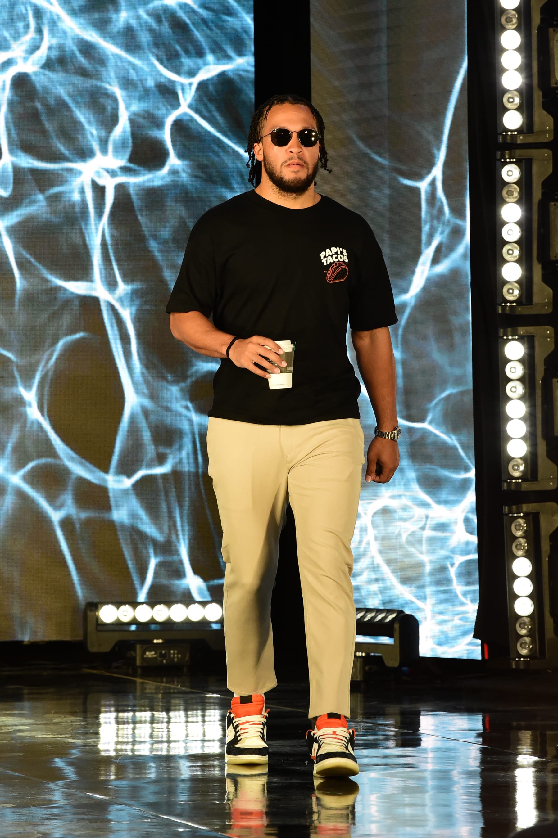 DALLAS, TX - MAY 24: Jalen Brunson #13 of the Dallas Mavericks arrives to the arena prior to the game against the Golden State Warriors during Game 4 of the 2022 NBA Playoffs Western Conference Finals  on May 24, 2022 at the American Airlines Center in Dallas, Texas. NOTE TO USER: User expressly acknowledges and agrees that, by downloading and or using this photograph, User is consenting to the terms and conditions of the Getty Images License Agreement. Mandatory Copyright Notice: Copyright 2022 NBAE (Photo by Noah Graham/NBAE via Getty Images)