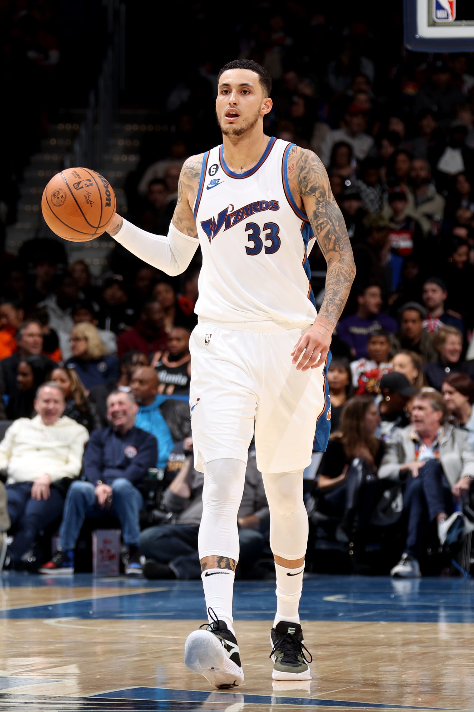WASHINGTON, DC -  MARCH 10: Kyle Kuzma #33 of the Washington Wizards handles the ball during the game against the Atlanta Hawks on March  10, 2023 at Capital One Arena in Washington, DC. NOTE TO USER: User expressly acknowledges and agrees that, by downloading and or using this Photograph, user is consenting to the terms and conditions of the Getty Images License Agreement. Mandatory Copyright Notice: Copyright 2023 NBAE (Photo by Stephen Gosling/NBAE via Getty Images)