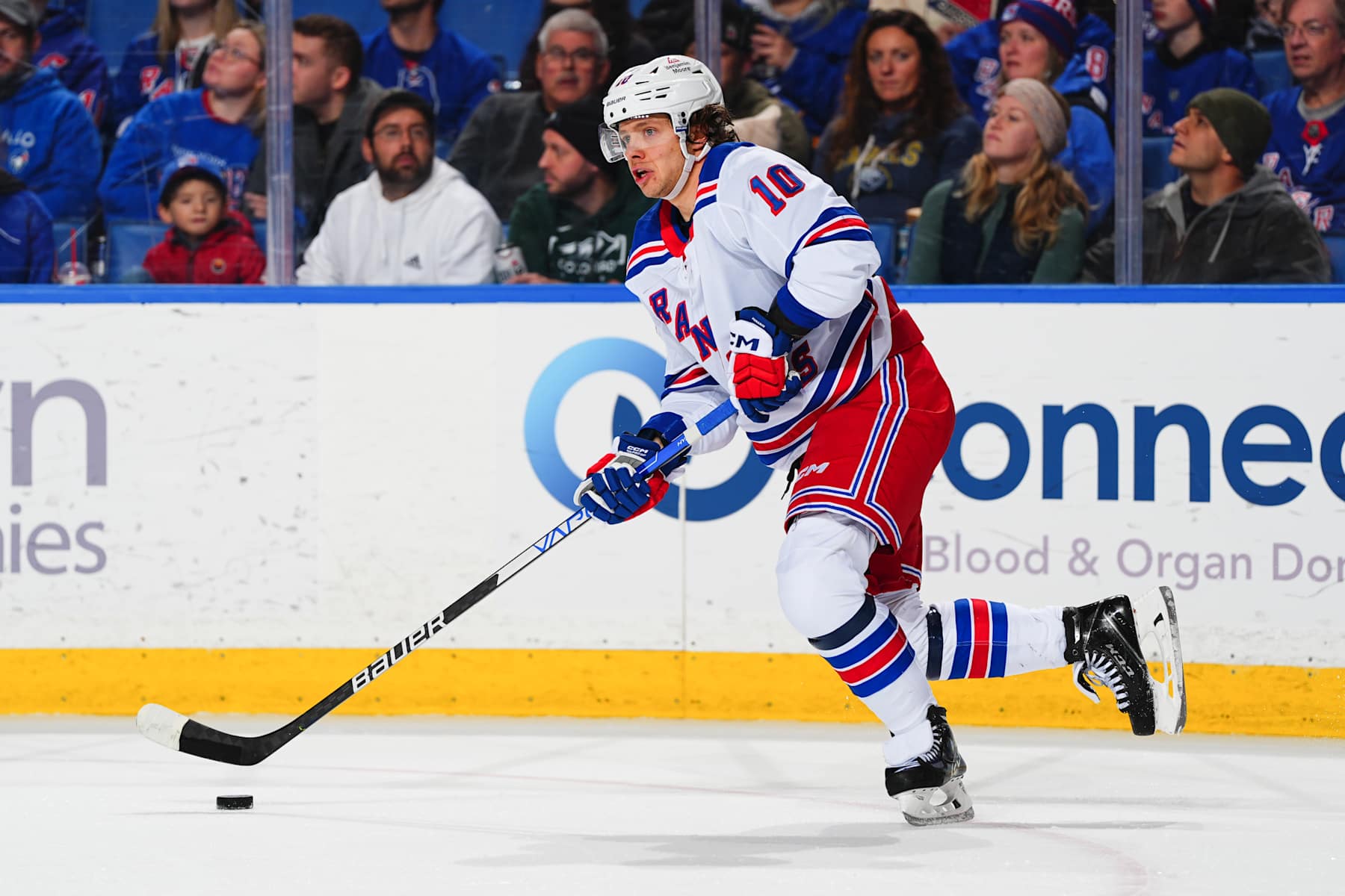 BUFFALO, NEW YORK - DECEMBER 11: Artemi Panarin #10 of the New York Rangers looks to make a play with the puck against against the Buffalo Sabres during the second period of an NHL game on December 11, 2024 at KeyBank Center in Buffalo, New York. (Photo by Ben Ludeman/NHLI via Getty Images)