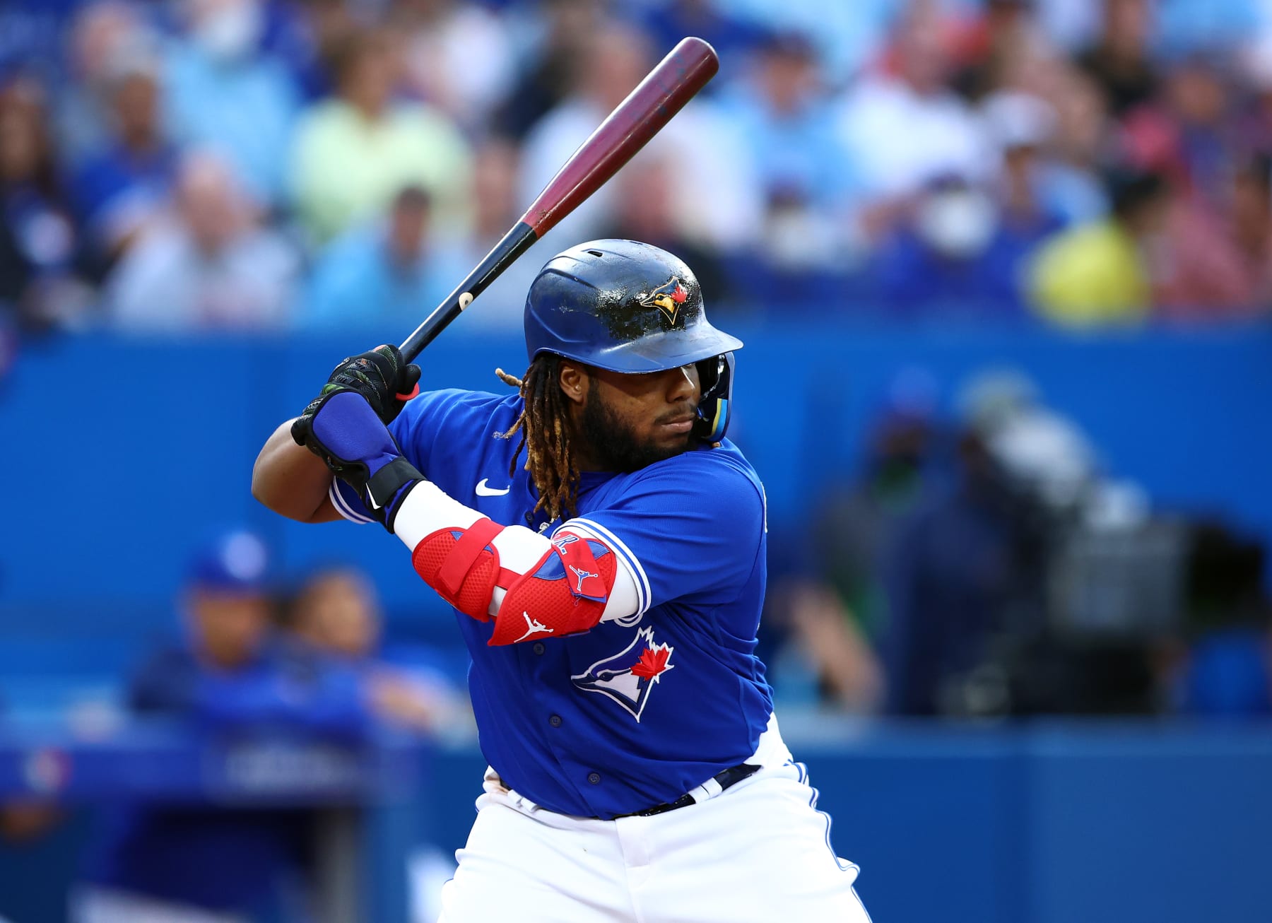 TORONTO, ON - JUNE 27:  Vladimir Guerrero Jr. #27 of the Toronto Blue Jays bats during a MLB game against the Boston Red Sox at Rogers Centre on June 27, 2022 in Toronto, Ontario, Canada.  (Photo by Vaughn Ridley/Getty Images)