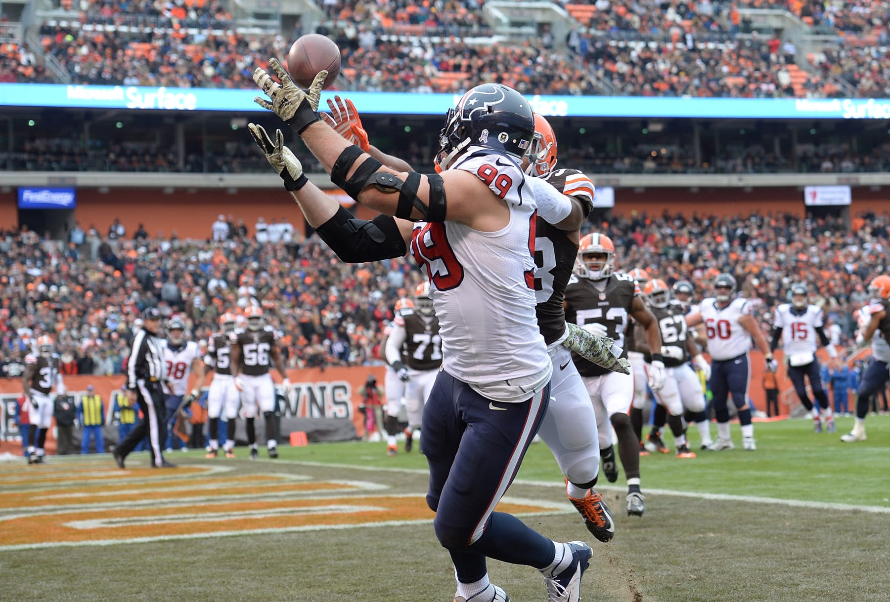 CLEVELAND, OH - NOVEMBER 16:  J.J. Watt #99 of the Houston Texans makes a touchdown catch in front of Chris Kirksey #58 of the Cleveland Browns during the first quarter at FirstEnergy Stadium on November 16, 2014 in Cleveland, Ohio.  (Photo by Jason Miller/Getty Images)