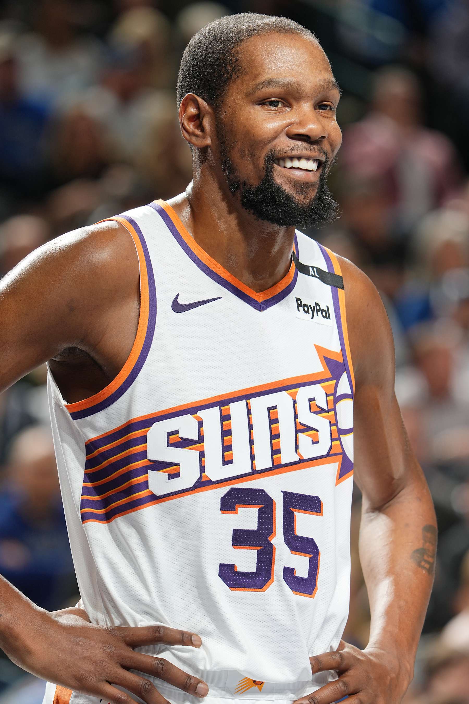 DALLAS, TX - NOVEMBER 8: Kevin Durant #35 of the Phoenix Suns smiles during the game against the Dallas Mavericks on November 6, 2024 at the American Airlines Center in Dallas, Texas. NOTE TO USER: User expressly acknowledges and agrees that, by downloading and or using this photograph, User is consenting to the terms and conditions of the Getty Images License Agreement. Mandatory Copyright Notice: Copyright 2024 NBAE (Photo by Glenn James/NBAE via Getty Images)