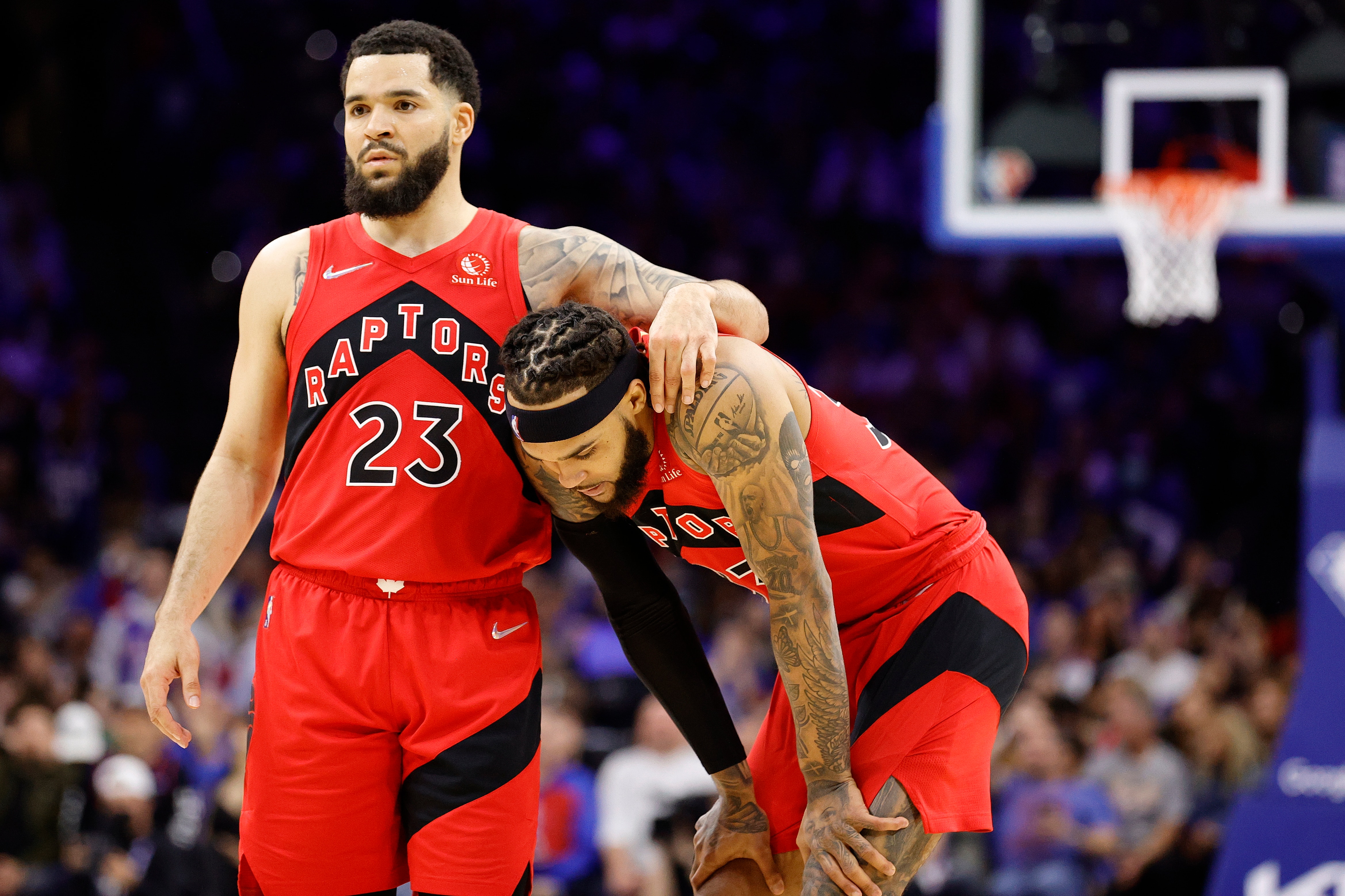 PHILADELPHIA, PENNSYLVANIA - APRIL 16: Fred VanVleet #23 and Gary Trent Jr. #33 of the Toronto Raptors look on during the third quarter against the Philadelphia 76ers during Game One of the Eastern Conference First Round at Wells Fargo Center on April 16, 2022 in Philadelphia, Pennsylvania. NOTE TO USER: User expressly acknowledges and agrees that, by downloading and or using this photograph, User is consenting to the terms and conditions of the Getty Images License Agreement. (Photo by Tim Nwachukwu/Getty Images)