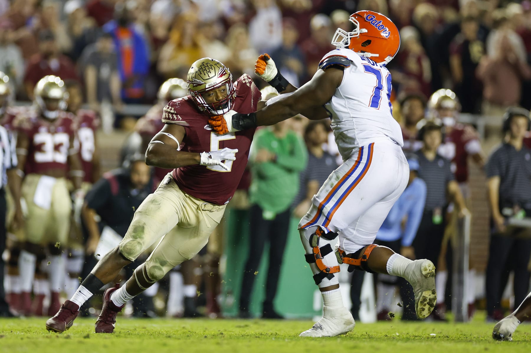 TALLAHASSEE, FL - NOVEMBER 25: Florida State Seminoles defensive lineman Jared Verse (5) battles Florida Gators offensive lineman Richard Gouraige (76) during the game between the Florida Gators and the Florida State Seminoles on November 25, 2022 at Doak Campbell Stadium in Tallahassee, Fl. (Photo by David Rosenblum/Icon Sportswire via Getty Images)