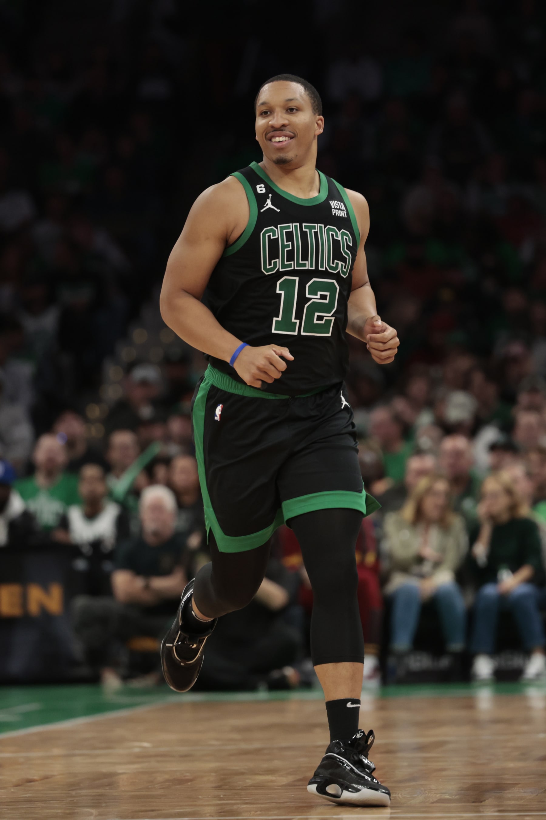 BOSTON, MASSACHUSETTS - OCTOBER 30: Grant Williams #12 of the Boston Celtics reacts during the fourth quarter against the Washington Wizards at TD Garden on October 30, 2022 in Boston, Massachusetts. NOTE TO USER: User expressly acknowledges and agrees that, by downloading and or using this photograph, User is consenting to the terms and conditions of the Getty Images License Agreement. (Photo by Nick Grace/Getty Images)