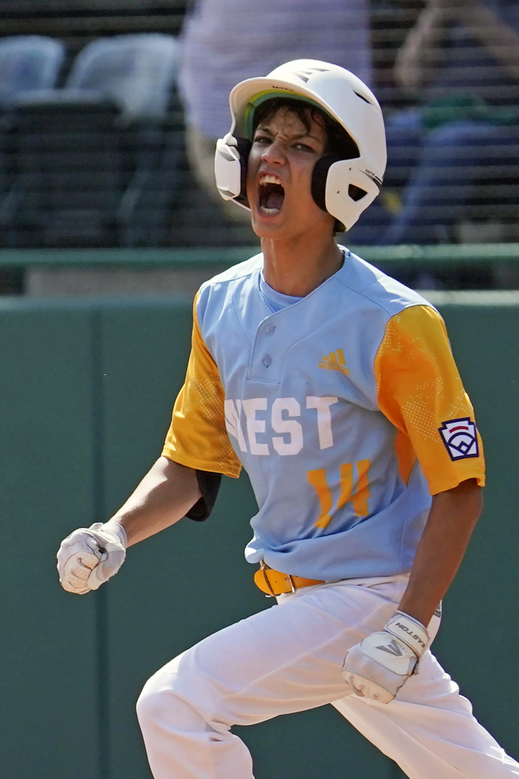 Honolulu's Kama Angell celebrates as he rounds the bases after hitting a solo home run off Curacao's Shemar Jacobus during the first inning of the Little League World Series Championship game in South Williamsport, Pa., Sunday, Aug. 28, 2022. (AP Photo/Gene J. Puskar) Honolulu's Kama Angell celebrates as he rounds the bases after hitting a solo home run off Curacao's Shemar Jacobus during the first inning of the Little League World Series Championship game in South Williamsport, Pa., Sunday, Aug. 28, 2022. (AP Photo/Gene J. Puskar)