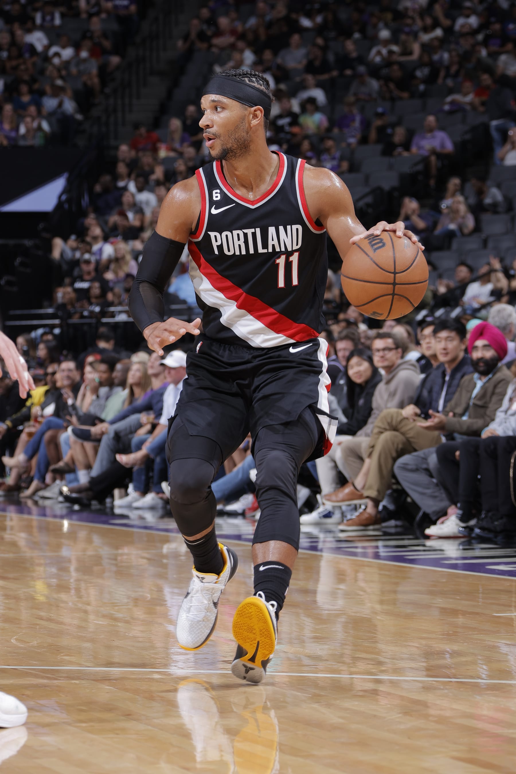 SACRAMENTO, CA - OCTOBER 9: Josh Hart #11 of the Portland Trail Blazers dribbles the ball against the Sacramento Kings during a preseason game on October 9, 2022 at Golden 1 Center in Sacramento, California. NOTE TO USER: User expressly acknowledges and agrees that, by downloading and or using this Photograph, user is consenting to the terms and conditions of the Getty Images License Agreement. Mandatory Copyright Notice: Copyright 2022 NBAE (Photo by Rocky Widner/NBAE via Getty Images)
