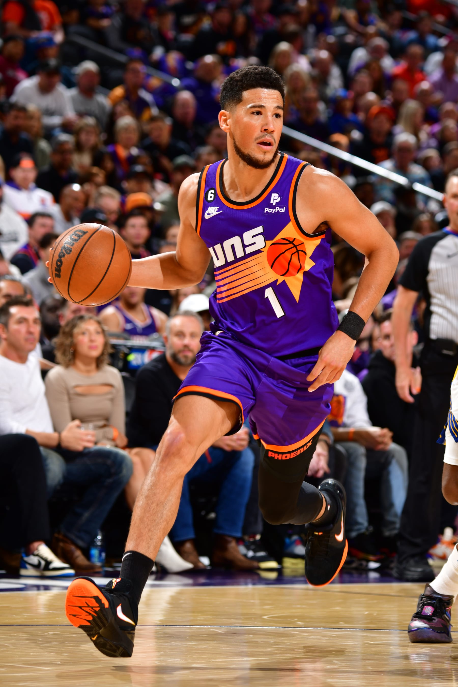 PHOENIX, AZ - OCTOBER 25: Devin Booker #1 of the Phoenix Suns drives to the basket during the game against the Golden State Warriors on October 25, 2022 at Footprint Center in Phoenix, Arizona. NOTE TO USER: User expressly acknowledges and agrees that, by downloading and or using this photograph, user is consenting to the terms and conditions of the Getty Images License Agreement. Mandatory Copyright Notice: Copyright 2022 NBAE (Photo by Barry Gossage/NBAE via Getty Images)
