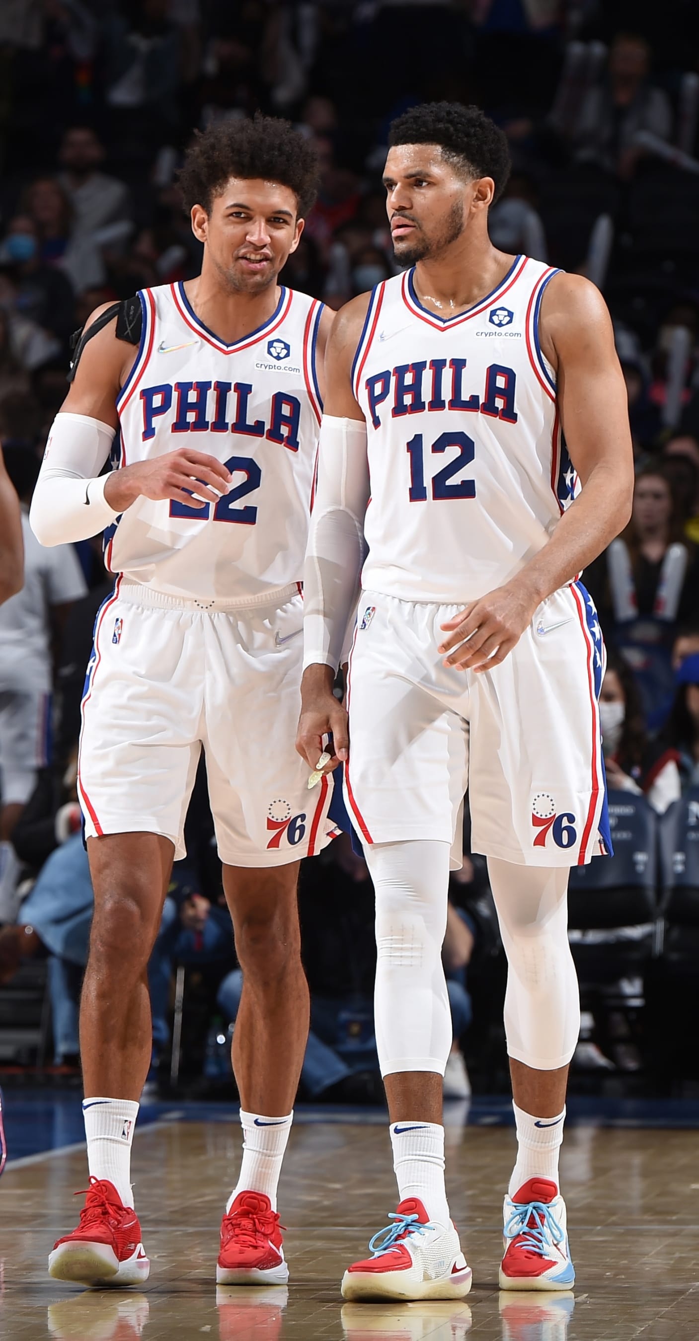 PHILADELPHIA, PA - FEBRUARY 12: Matisse Thybulle #22 of the Philadelphia 76ers talks with Tobias Harris #12 during the game against the Cleveland Cavaliers on February 12, 2022 at the Wells Fargo Center in Philadelphia, Pennsylvania NOTE TO USER: User expressly acknowledges and agrees that, by downloading and/or using this Photograph, user is consenting to the terms and conditions of the Getty Images License Agreement. Mandatory Copyright Notice: Copyright 2022 NBAE (Photo by David Dow/NBAE via Getty Images)