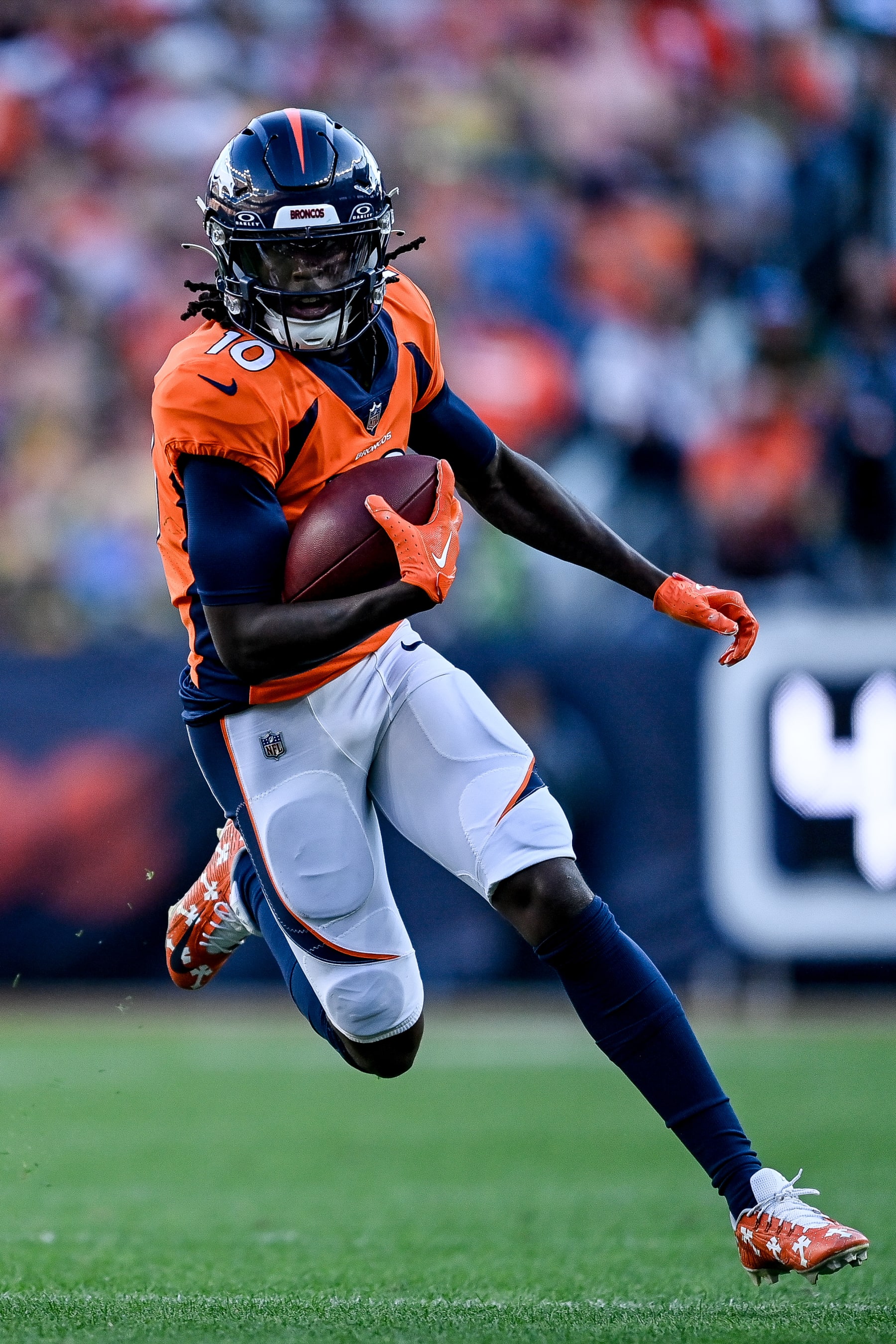 DENVER, COLORADO - OCTOBER 22: Wide receiver Jerry Jeudy #10 of the Denver Broncos runs for a first down after a catch in the fourth quarter against the Green Bay Packers at Empower Field at Mile High on October 22, 2023 in Denver, Colorado. (Photo by Dustin Bradford/Getty Images) DENVER, COLORADO - OCTOBER 22: Wide receiver Jerry Jeudy #10 of the Denver Broncos runs for a first down after a catch in the fourth quarter against the Green Bay Packers at Empower Field at Mile High on October 22, 2023 in Denver, Colorado. (Photo by Dustin Bradford/Getty Images)