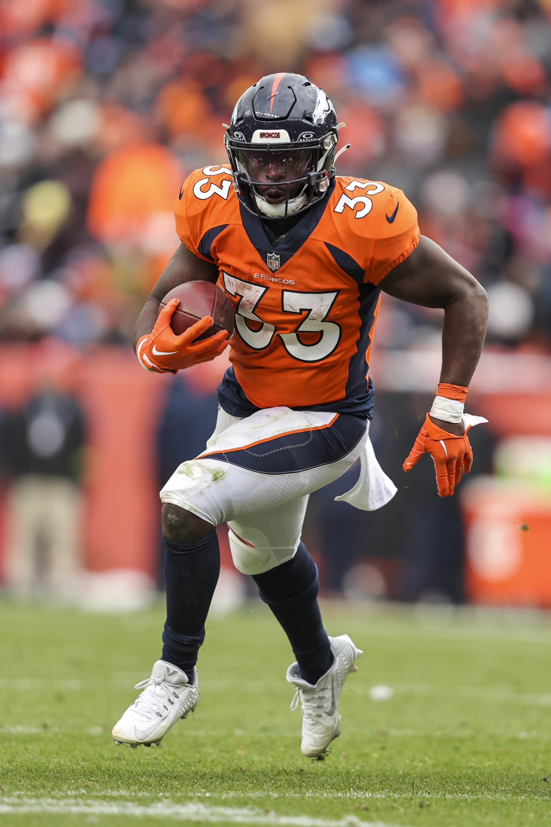 DENVER, COLORADO - OCTOBER 29: Javonte Williams #33 of the Denver Broncos runs with the ball during an NFL football game between the Denver Broncos and the Kansas City Chiefs at Empower Field At Mile High on October 29, 2023 in Denver, Colorado. (Photo by Michael Owens/Getty Images)