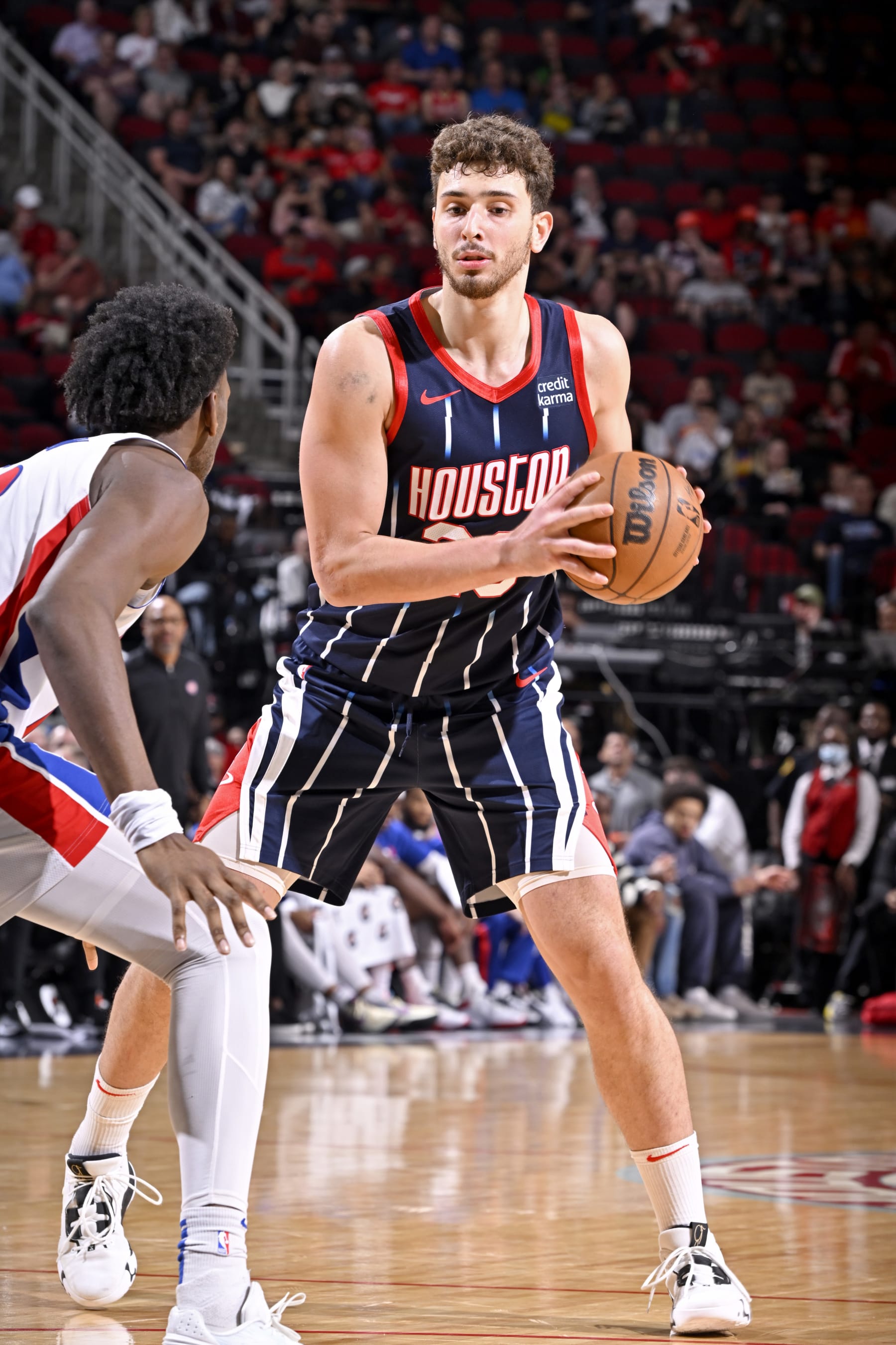 HOUSTON, TX - MARCH 31:  Alperen Sengun #28 of the Houston Rockets dribbles the ball against the Detroit Pistons on March 31, 2023 at the Toyota Center in Houston, Texas. NOTE TO USER: User expressly acknowledges and agrees that, by downloading and or using this photograph, User is consenting to the terms and conditions of the Getty Images License Agreement. Mandatory Copyright Notice: Copyright 2023 NBAE (Photo by Logan Riely/NBAE via Getty Images)
