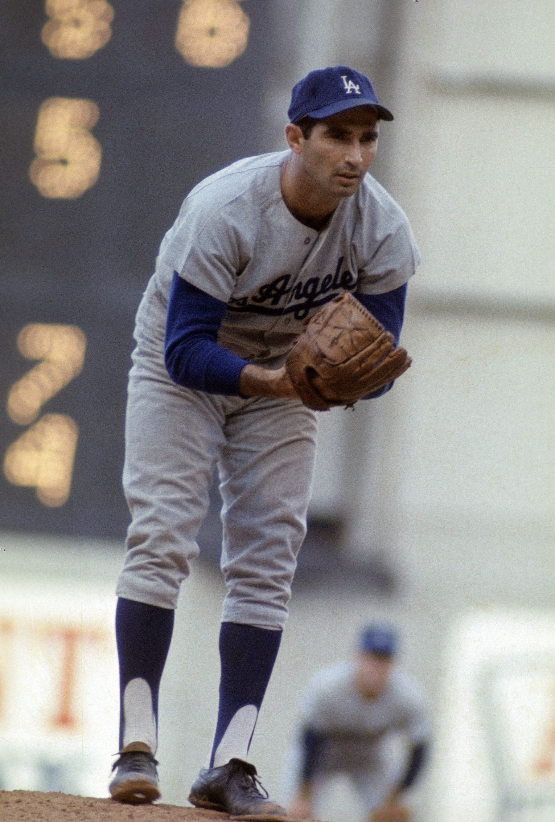 CIRCA 1960's: Pitcher Sandy Koufax #32 of the Los Angeles Dodgers stares in to get the sign from the catcher during a circa mid 1960's Major League Baseball game. Koufax played for the Dodgers from 1955-66. (Photo by Focus on Sport/Getty Images)