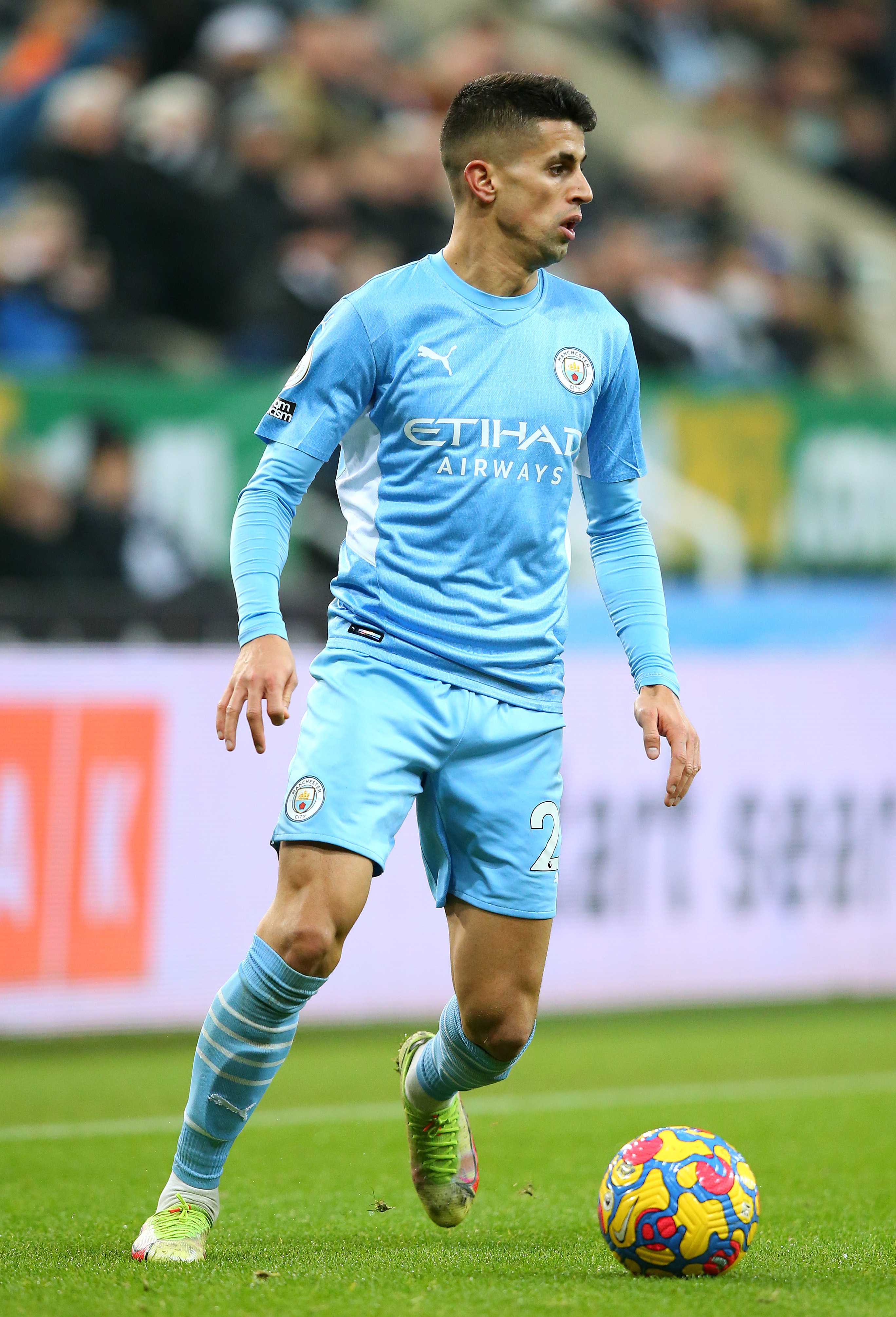 NEWCASTLE UPON TYNE, ENGLAND - DECEMBER 19:  Joao Cancelo of Manchester City during the Premier League match between Newcastle United  and  Manchester City at St. James Park on December 19, 2021 in Newcastle upon Tyne, England. (Photo by Alex Livesey/Getty Images)