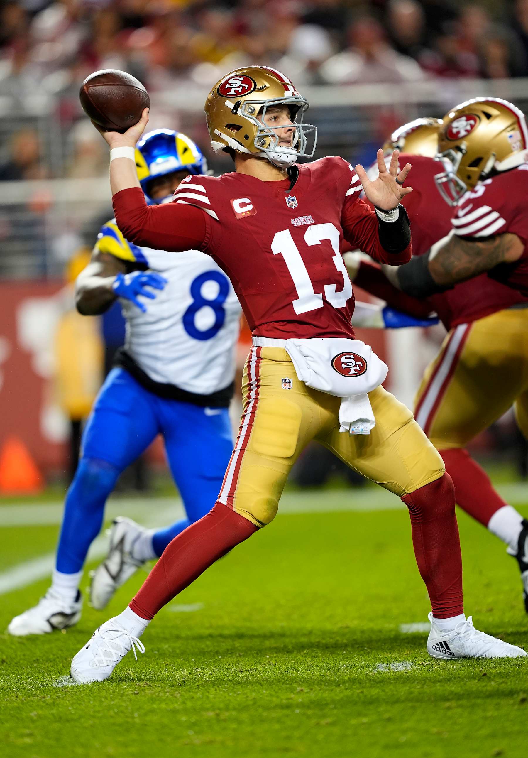 SANTA CLARA, CALIFORNIA - DECEMBER 12: Brock Purdy #13 of the San Francisco 49ers throws a pass against the Los Angeles Rams during the fourth quarter in the game at Levi's Stadium on December 12, 2024 in Santa Clara, California. (Photo by Thearon W. Henderson/Getty Images)