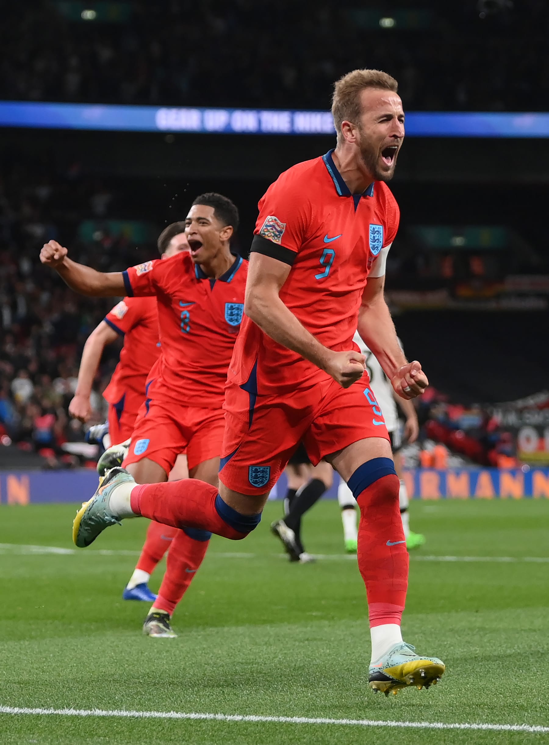 LONDON, ENGLAND - SEPTEMBER 26:  Harry Kane of England celebrates after scoring their team's third goal from the penalty spot during the UEFA Nations League League A Group 3 match between England and Germany at Wembley Stadium on September 26, 2022 in London, England. (Photo by Shaun Botterill/Getty Images)