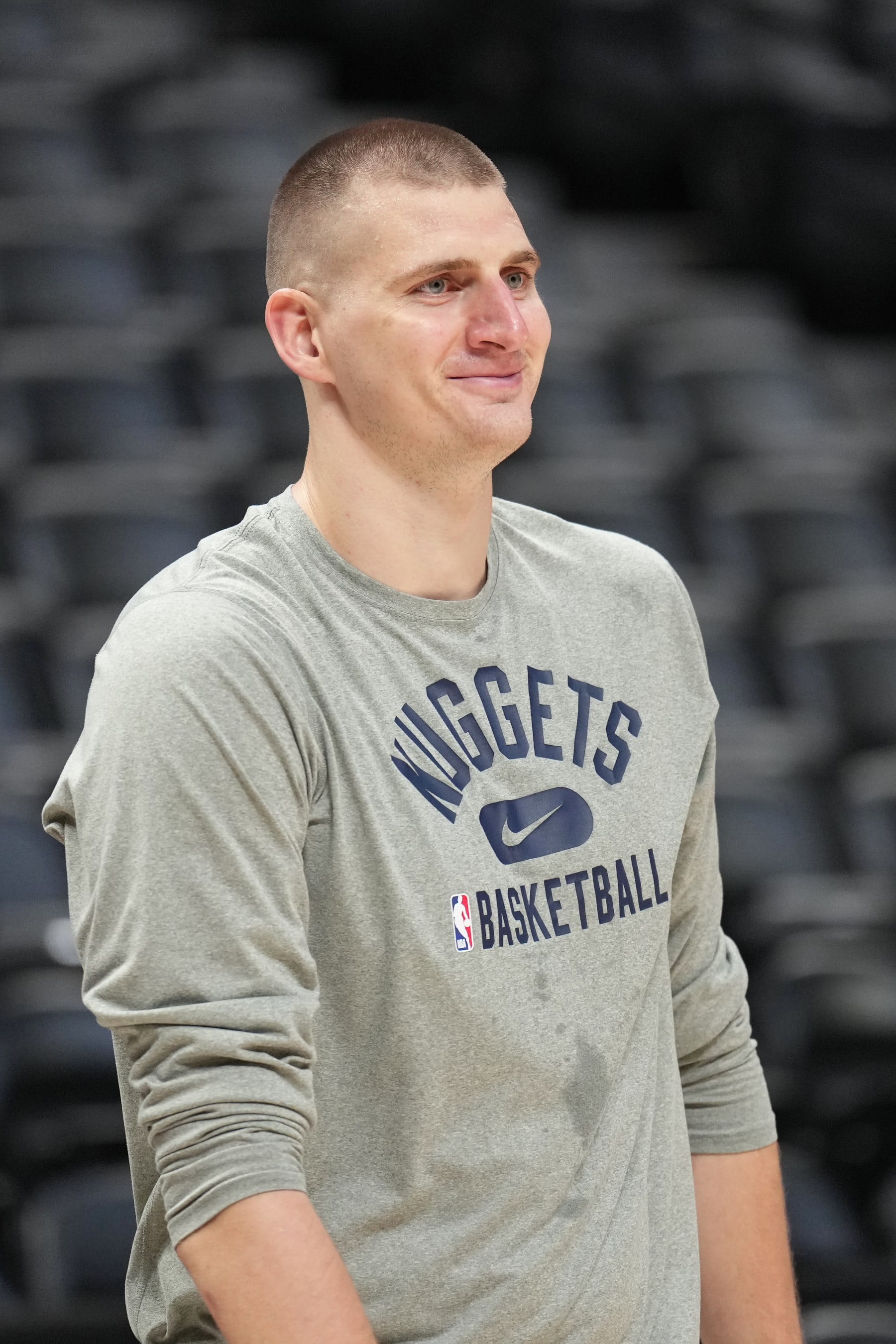 DENVER, CO - JUNE 3: Nikola Jokic #15 of the Denver Nuggets smiles during 2023 NBA Finals Practice and Media Availability on June 3, 2023 at the Ball Arena in Denver, Colorado. NOTE TO USER: User expressly acknowledges and agrees that, by downloading and/or using this Photograph, user is consenting to the terms and conditions of the Getty Images License Agreement. Mandatory Copyright Notice: Copyright 2023 NBAE (Photo by Jesse D. Garrabrant/NBAE via Getty Images)