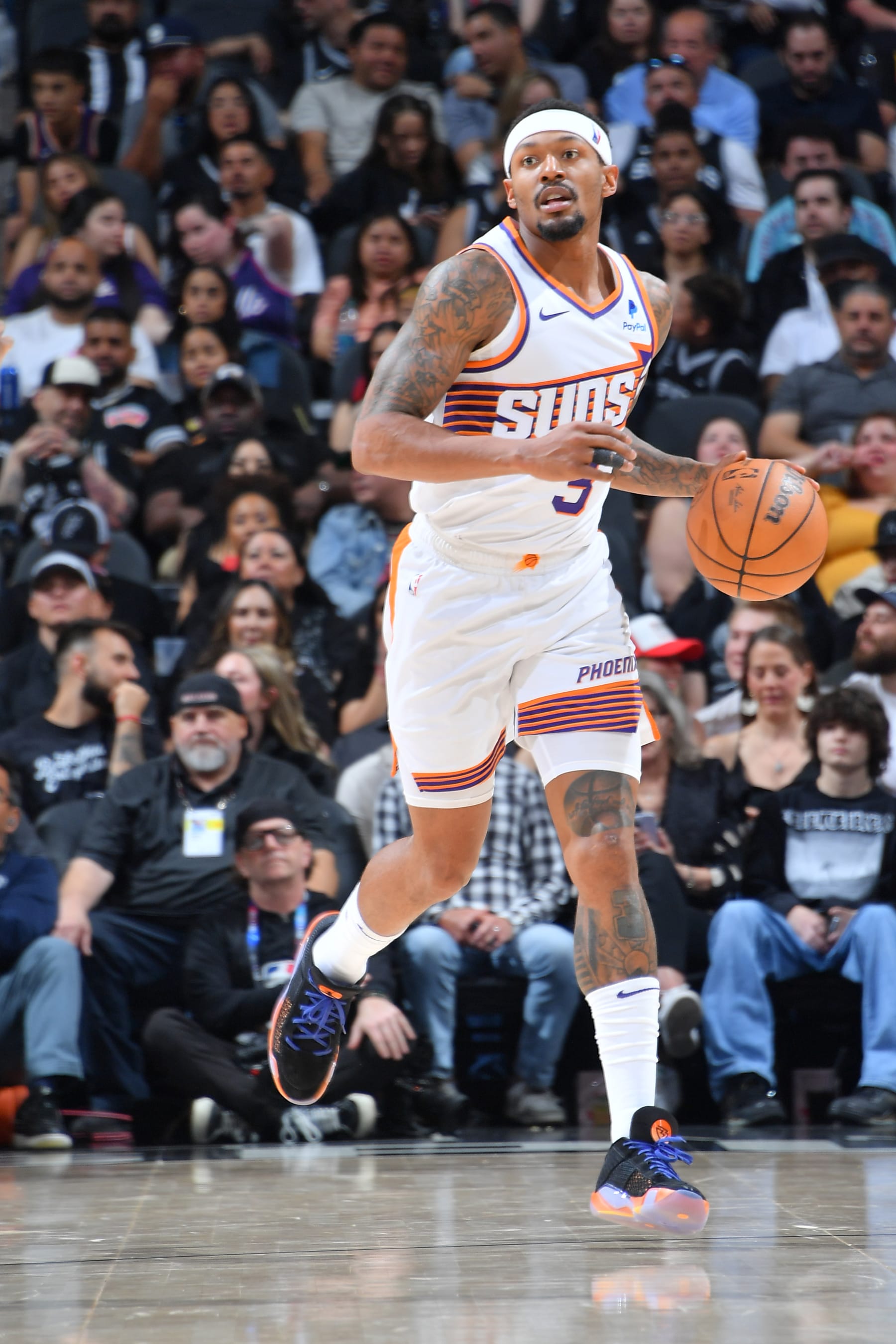 SAN ANTONIO, TX - MARCH 23: Bradley Beal #3 of the Phoenix Suns dribbles the ball during the game against the San Antonio Spurs on March 23, 2024 at the Frost Bank Center in San Antonio, Texas. NOTE TO USER: User expressly acknowledges and agrees that, by downloading and or using this photograph, user is consenting to the terms and conditions of the Getty Images License Agreement. Mandatory Copyright Notice: Copyright 2024 NBAE (Photos by Michael Gonzales/NBAE via Getty Images)