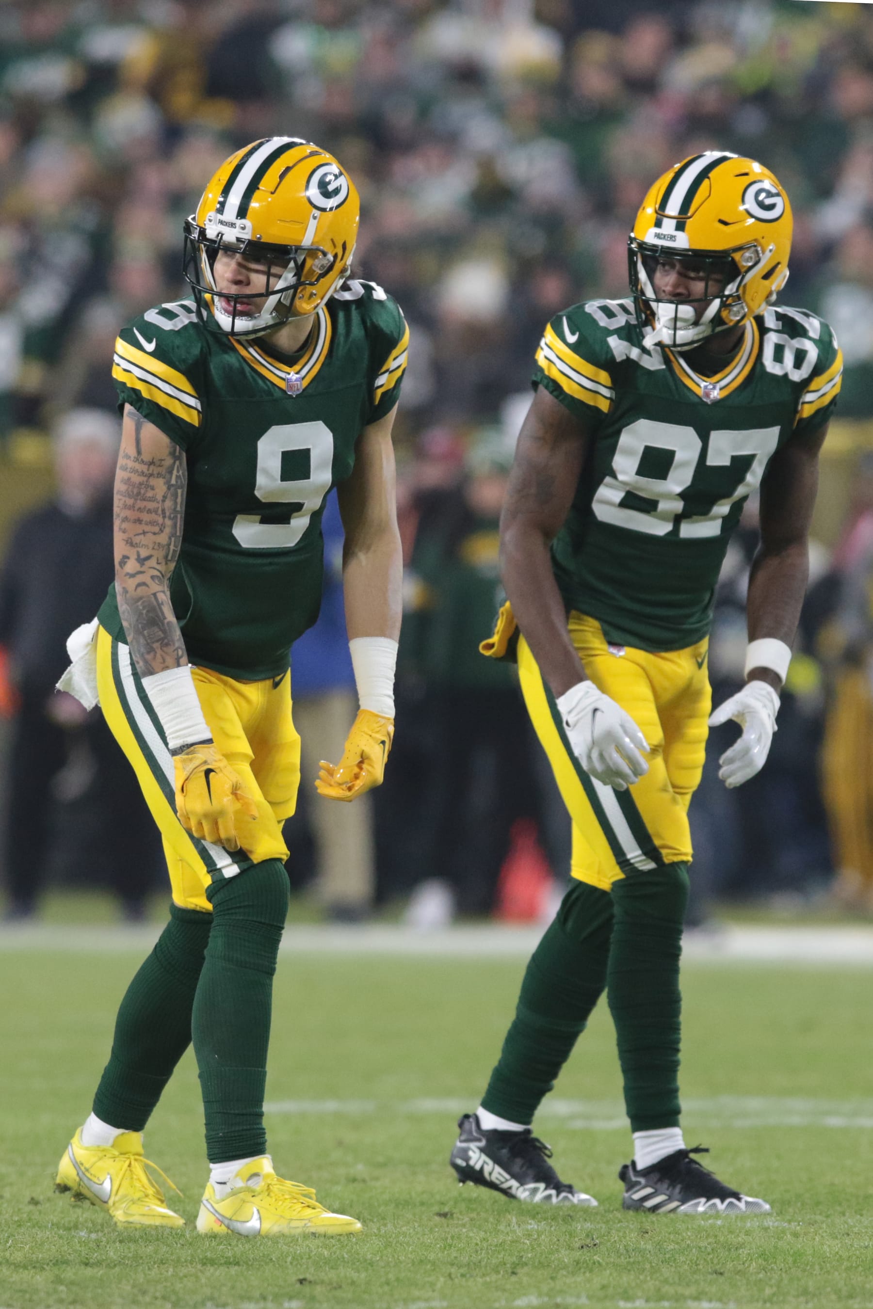 GREEN BAY, WI - JANUARY 08: Green Bay Packers wide receiver Christian Watson (9) and Green Bay Packers wide receiver Romeo Doubs (87) line up during a game between the Green Bay Packers and the Detroit Lions at Lambeau Field on January 8, 2023 in Green Bay, WI. (Photo by Larry Radloff/Icon Sportswire via Getty Images)