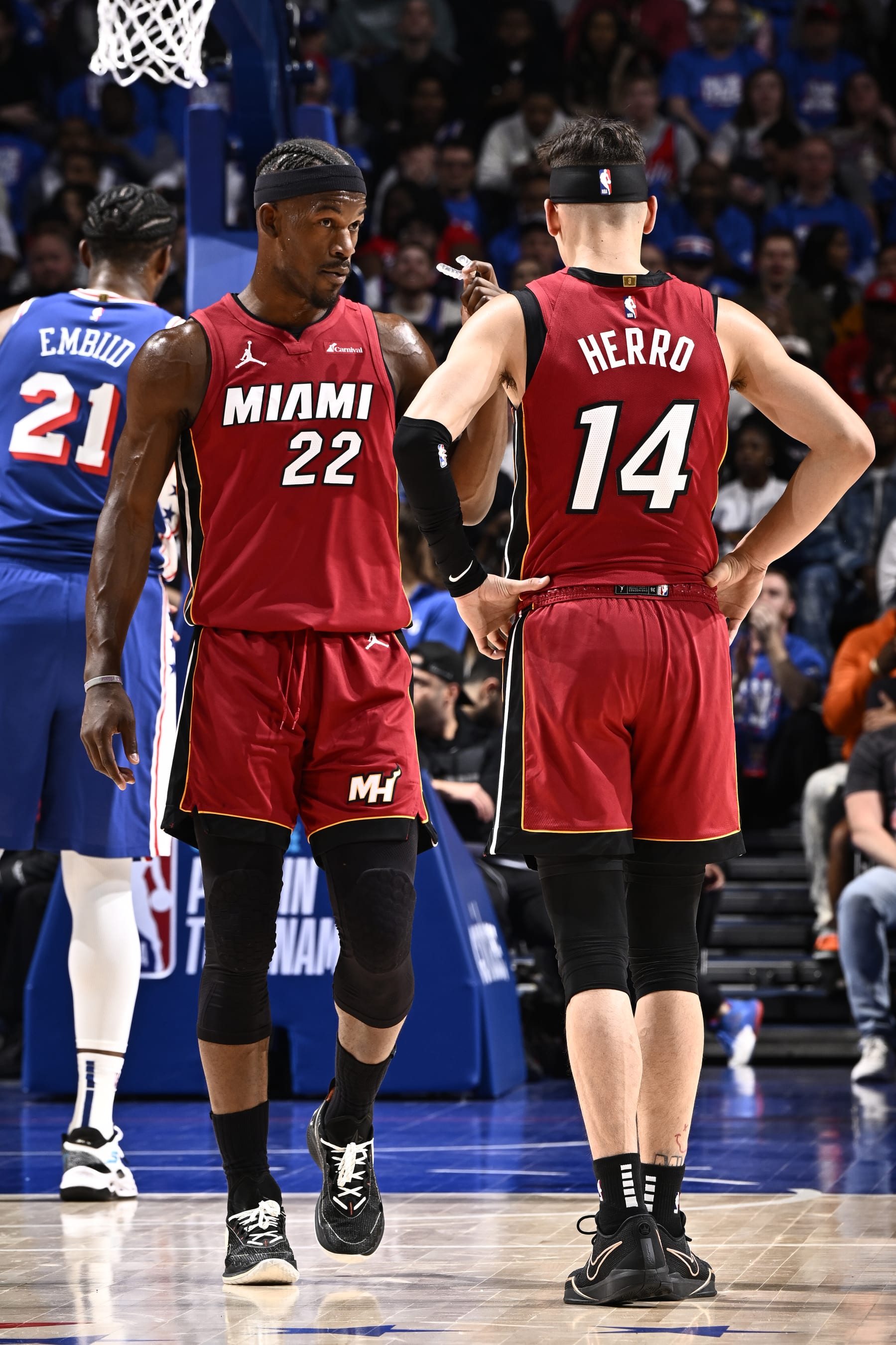 PHILADELPHIA, PA - APRIL 17:  Jimmy Butler #22- and Tyler Herro #14 of the Miami Heat talk during the game against the Philadelphia 76ers during the 2024 NBA Play-In Tournament on April 17, 2024 at the Wells Fargo Center in Philadelphia, Pennsylvania NOTE TO USER: User expressly acknowledges and agrees that, by downloading and/or using this Photograph, user is consenting to the terms and conditions of the Getty Images License Agreement. Mandatory Copyright Notice: Copyright 2024 NBAE (Photo by David Dow/NBAE via Getty Images)