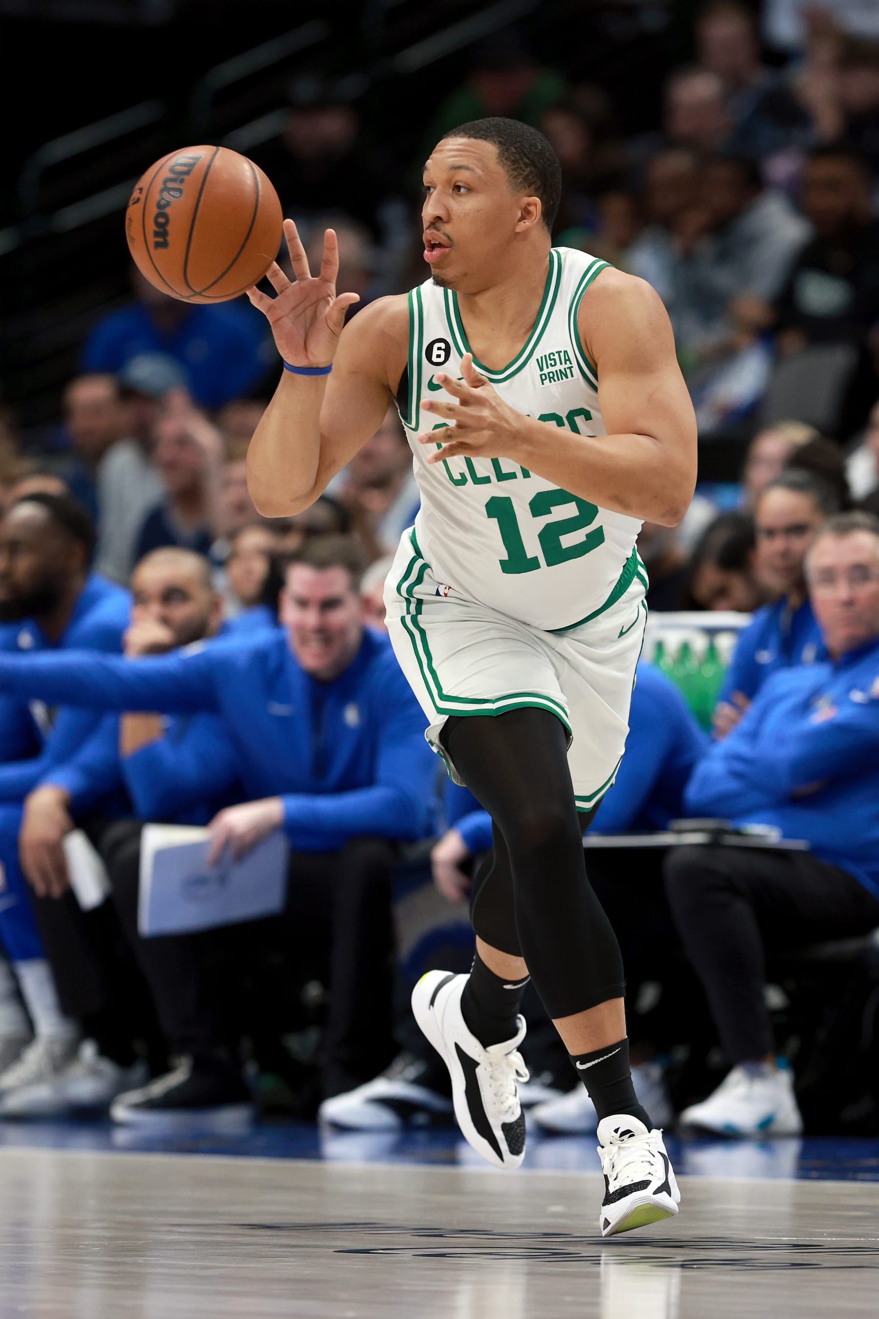 DALLAS, TEXAS - JANUARY 05: Grant Williams #12 of the Boston Celtics passes the ball against the Dallas Mavericks in the second half at American Airlines Center on January 05, 2023 in Dallas, Texas. NOTE TO USER: User expressly acknowledges and agrees that, by downloading and or using this photograph, User is consenting to the terms and conditions of the Getty Images License Agreement. (Photo by Tom Pennington/Getty Images)