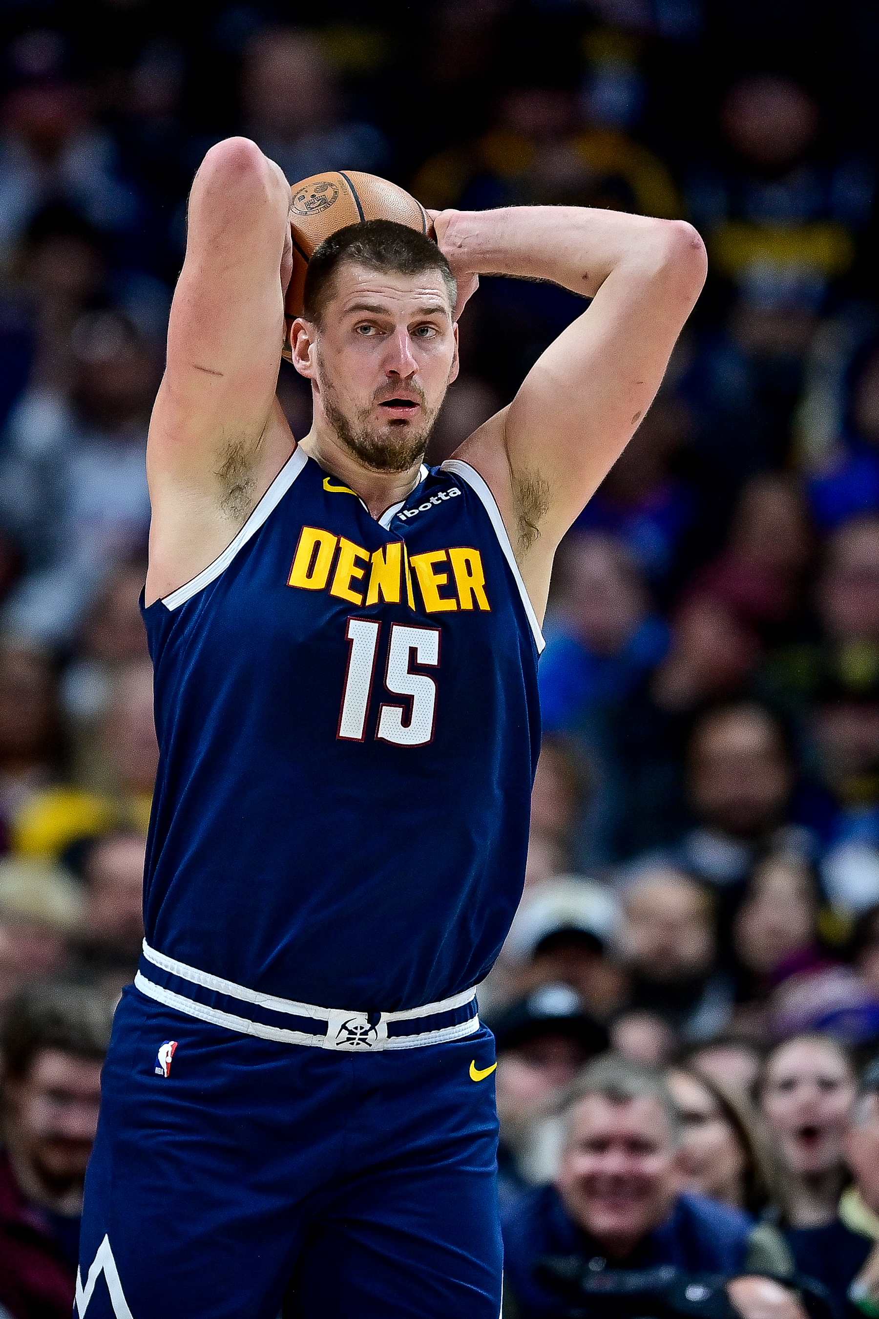 DENVER, COLORADO - DECEMBER 13: Nikola Jokic #15 of the Denver Nuggets looks to pass against the LA Clippers in the first half at Ball Arena on December 13, 2024, 2024 in Denver, Colorado. NOTE TO USER: User expressly acknowledges and agrees that, by downloading and or using this photograph, User is consenting to the terms and conditions of the Getty Images License Agreement. (Photo by Dustin Bradford/Getty Images)